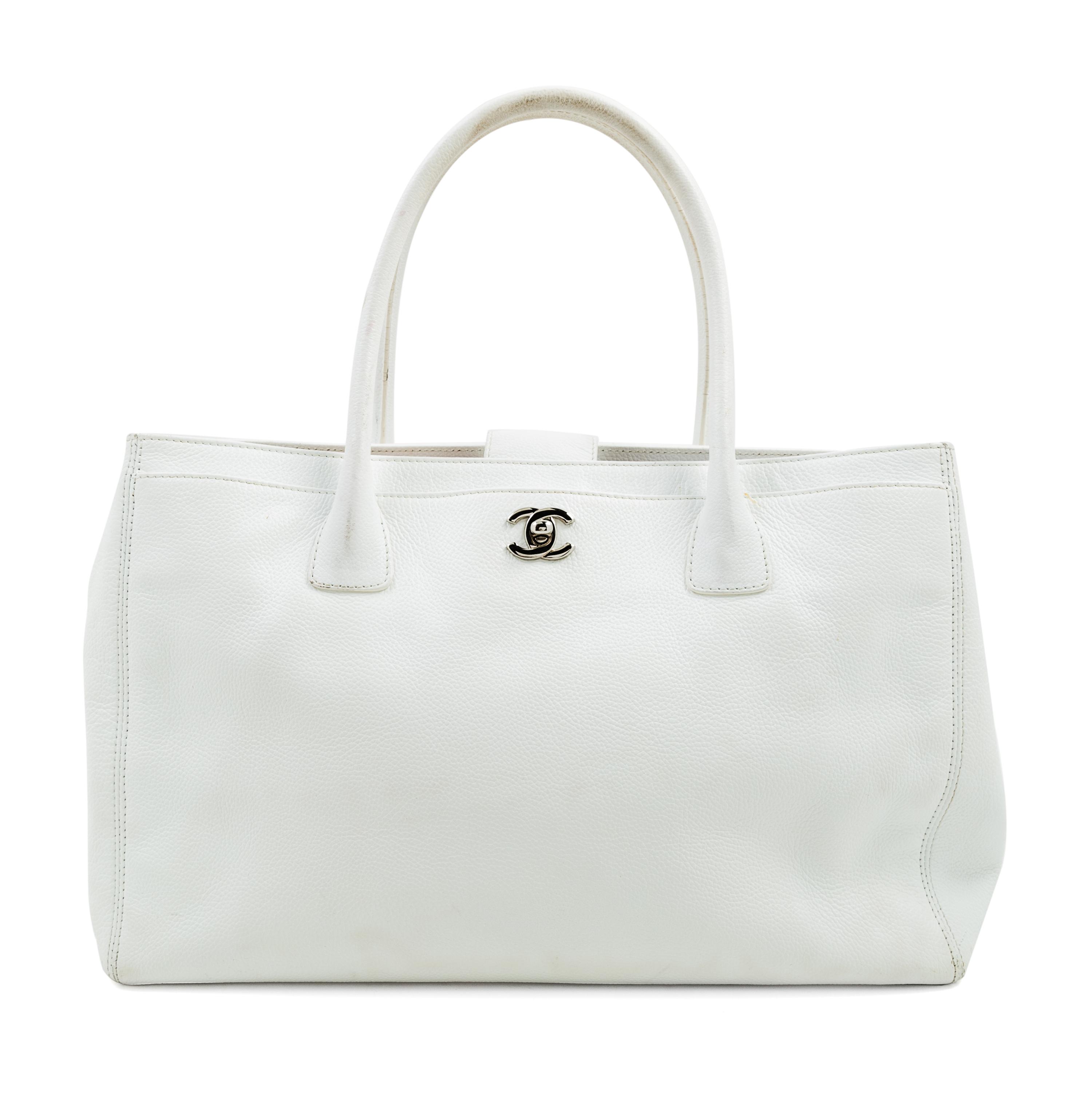 A Chanel White Caviar Tote Bag, 13.3" x 10" x 5.5"; Handle drop: 6.5".