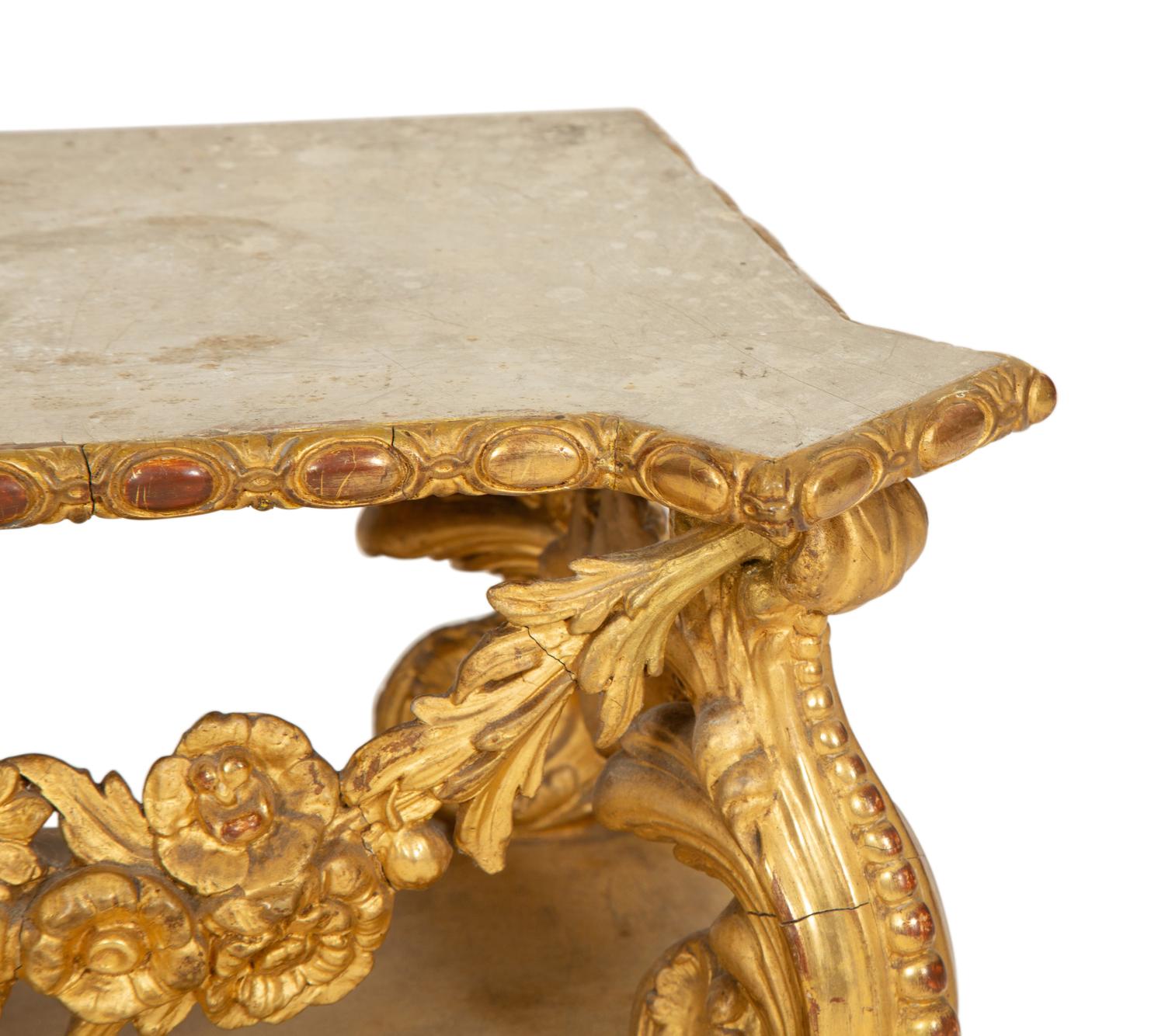 A Georgian Carved, Painted and Parcel Gilt Shaped Pedestal Base