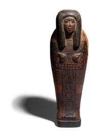 An Egyptian Style Painted Wood Ushabti Coffin