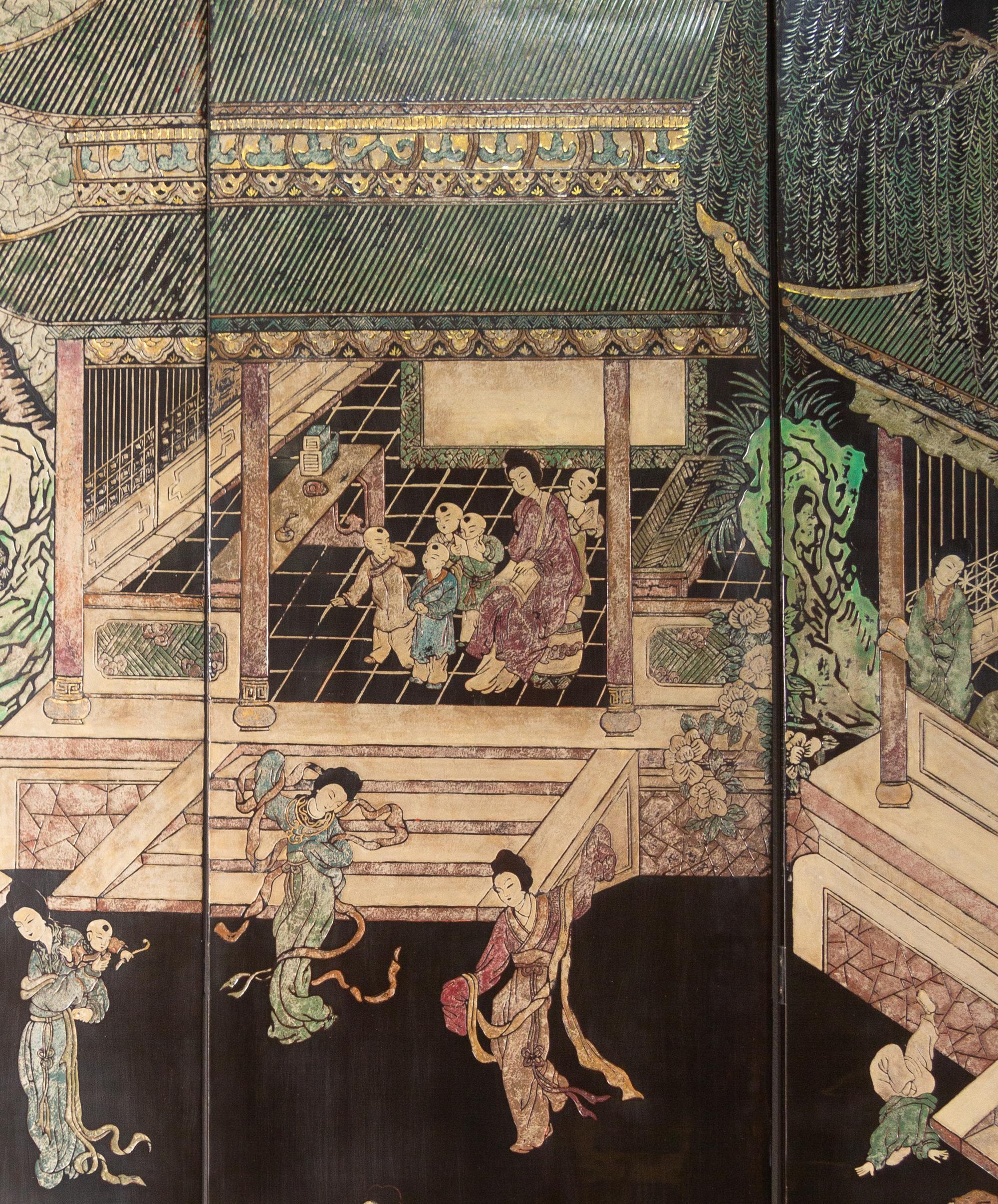 A Twelve-Paneled Coromandel Lacquer Floor Screen