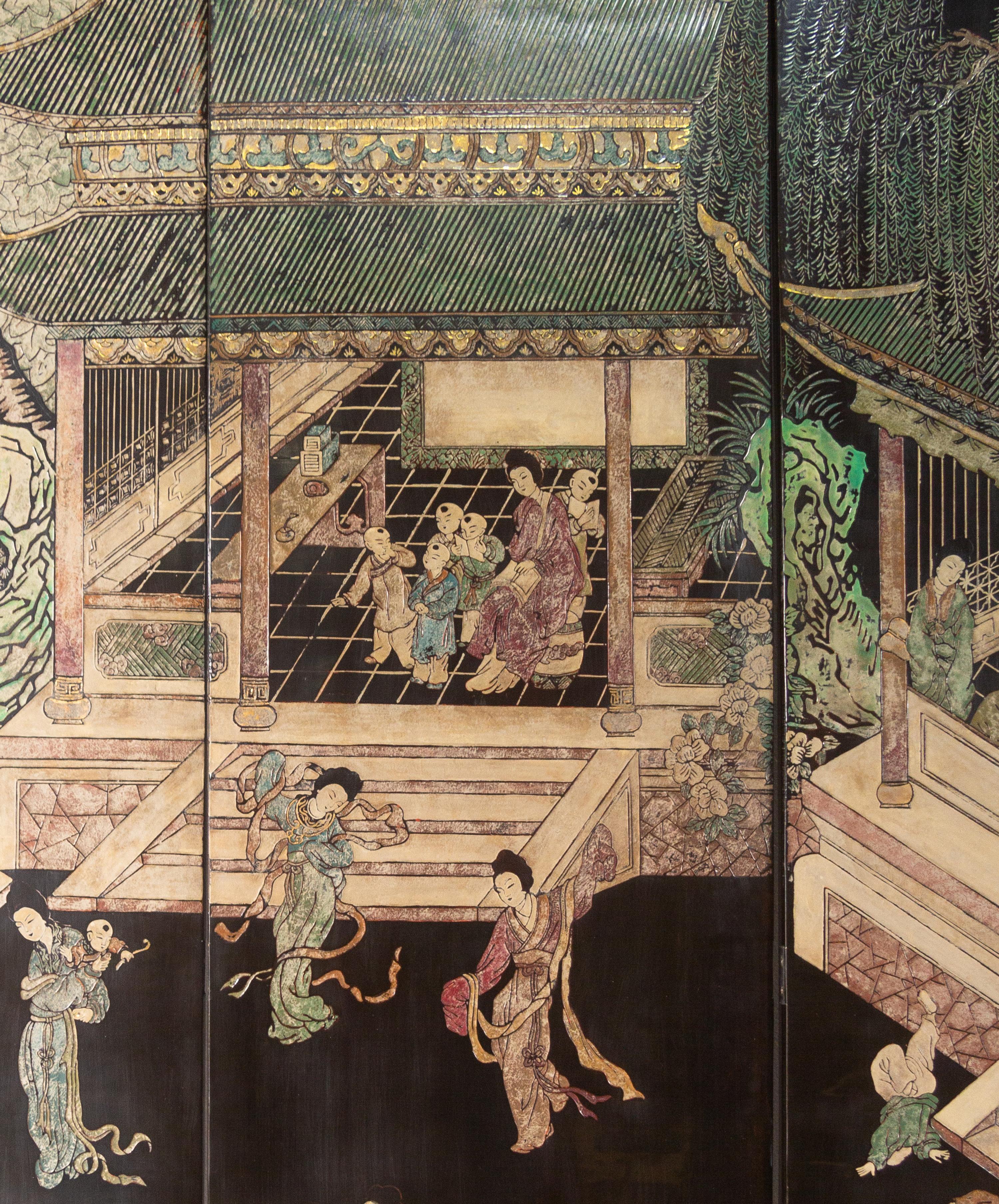 A Twelve-Paneled Coromandel Lacquer Floor Screen