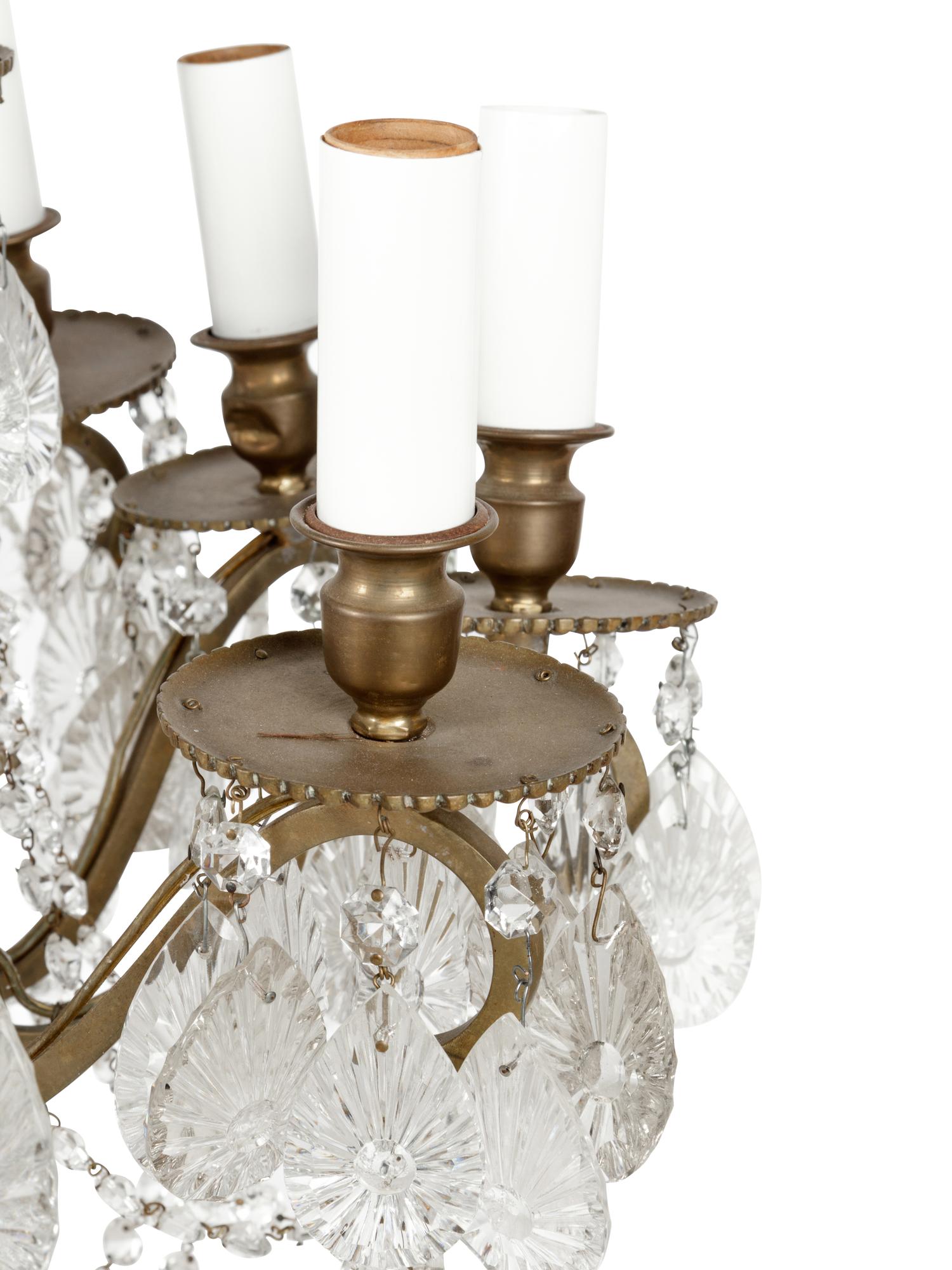 A Continental Bronze and Cut Glass Twenty-Four-Light Chandelier