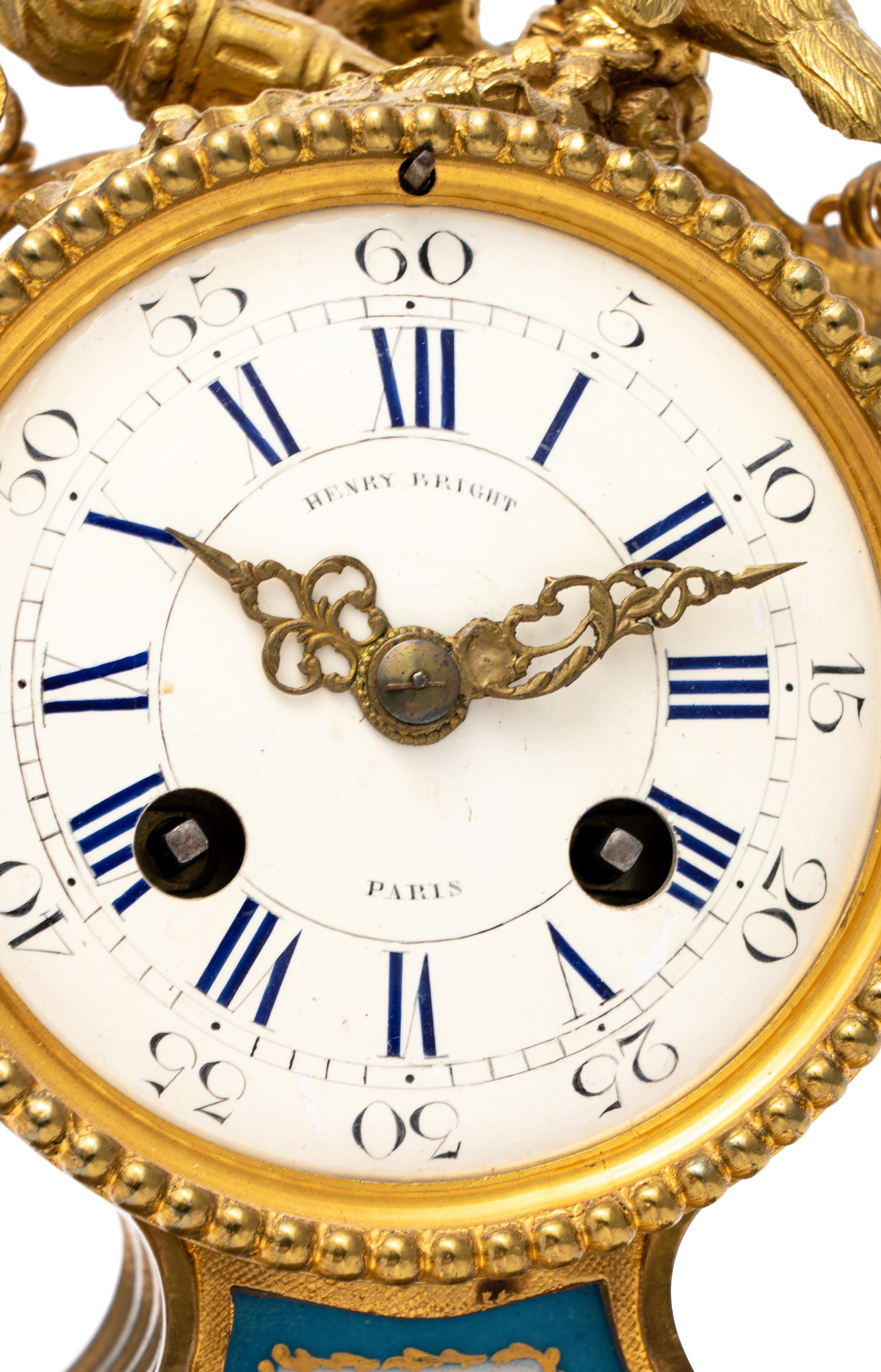 A French Gilt Metal and Porcelain Clock