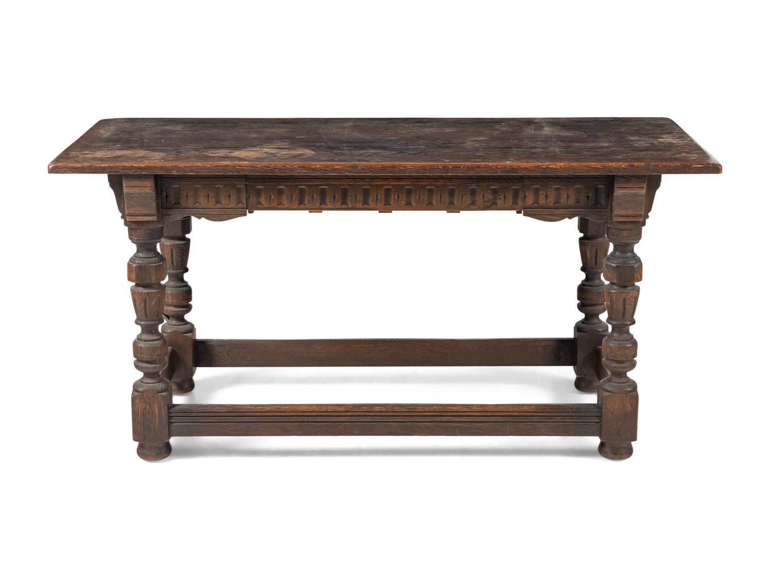 A Renaissance Revival Carved Oak Library Table
