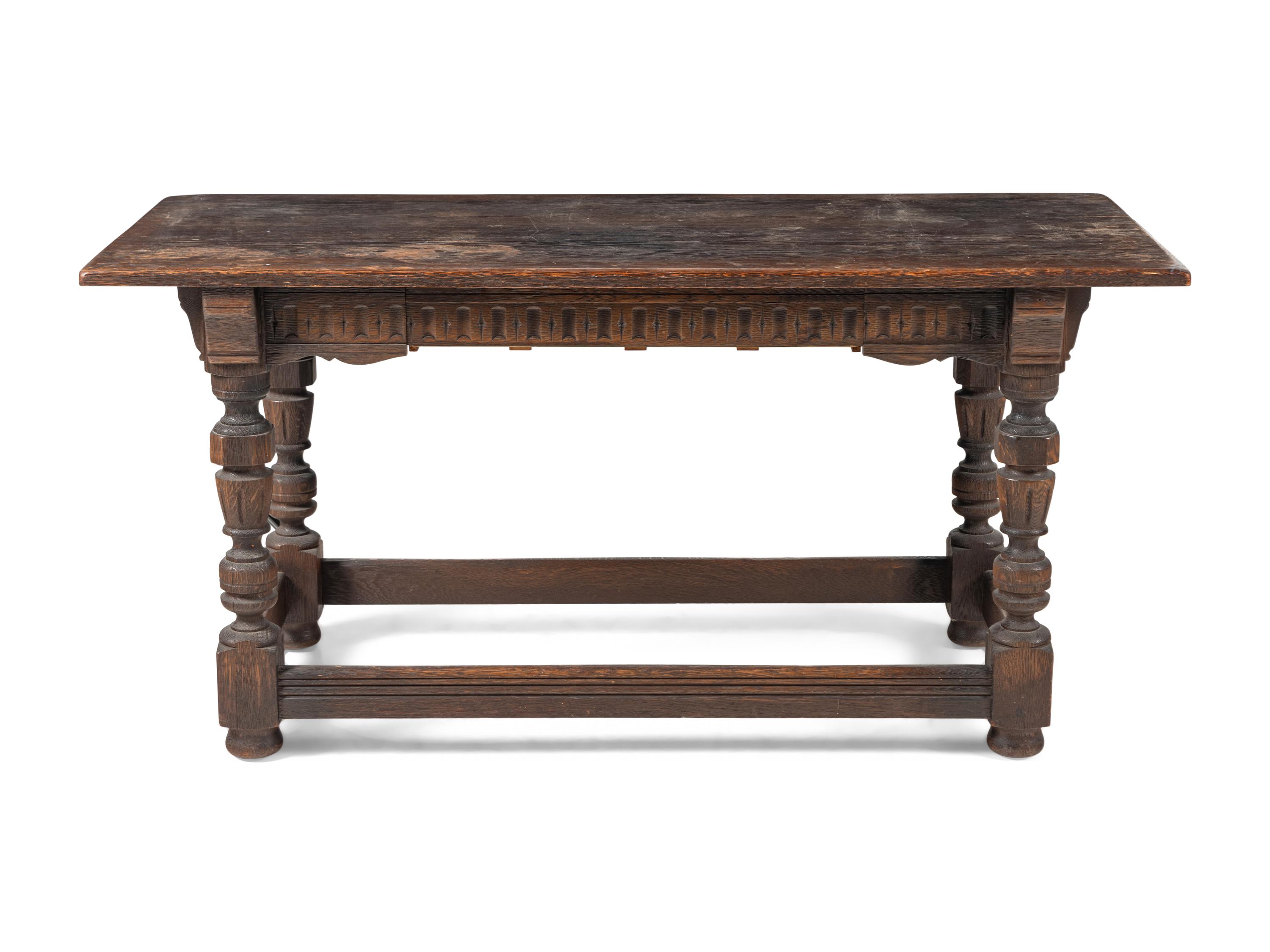 A Renaissance Revival Carved Oak Library Table