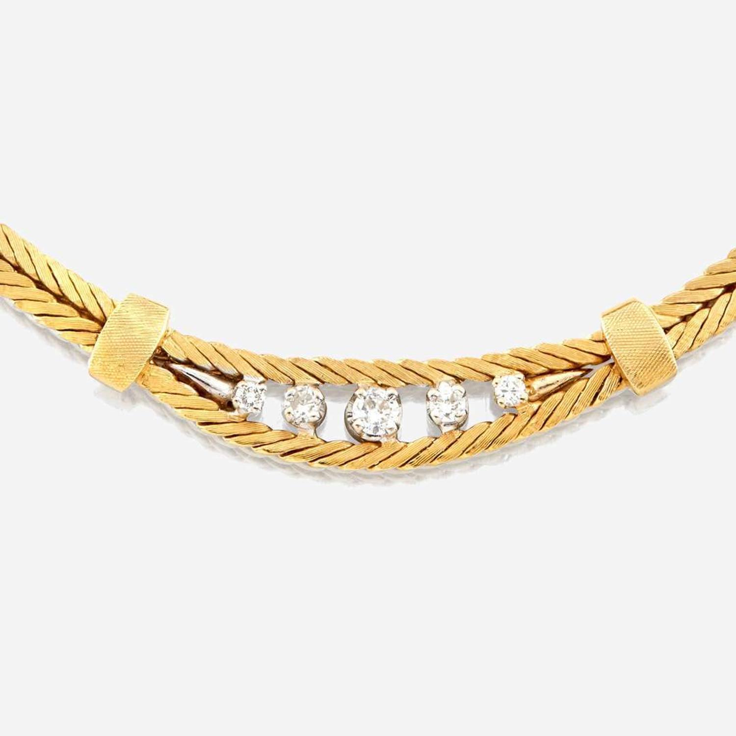 A gold and diamond necklace with matching bracelet Italy