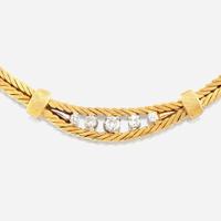 A gold and diamond necklace with matching bracelet Italy