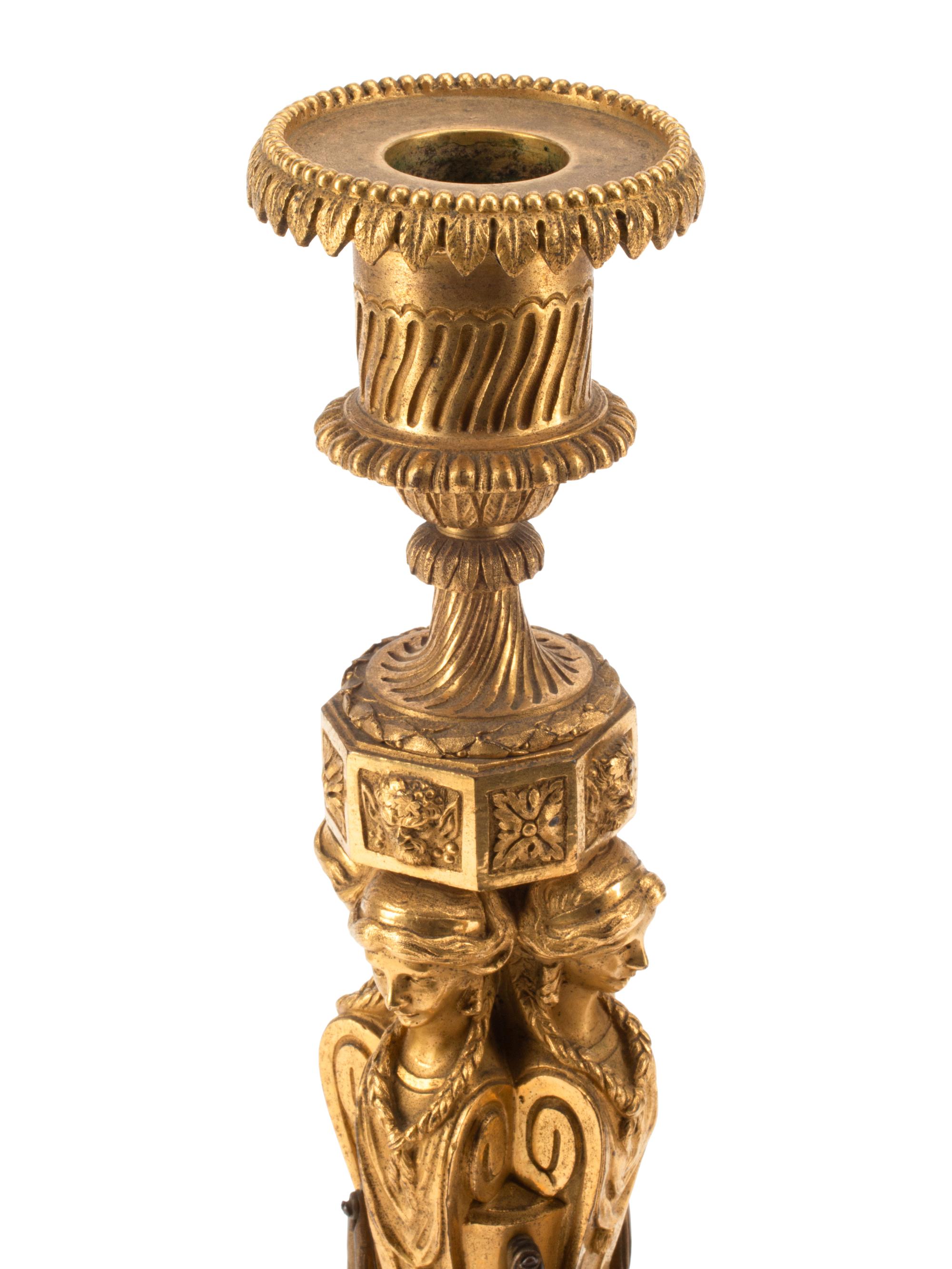 A Pair of Charles X Gilt Bronze Candlesticks