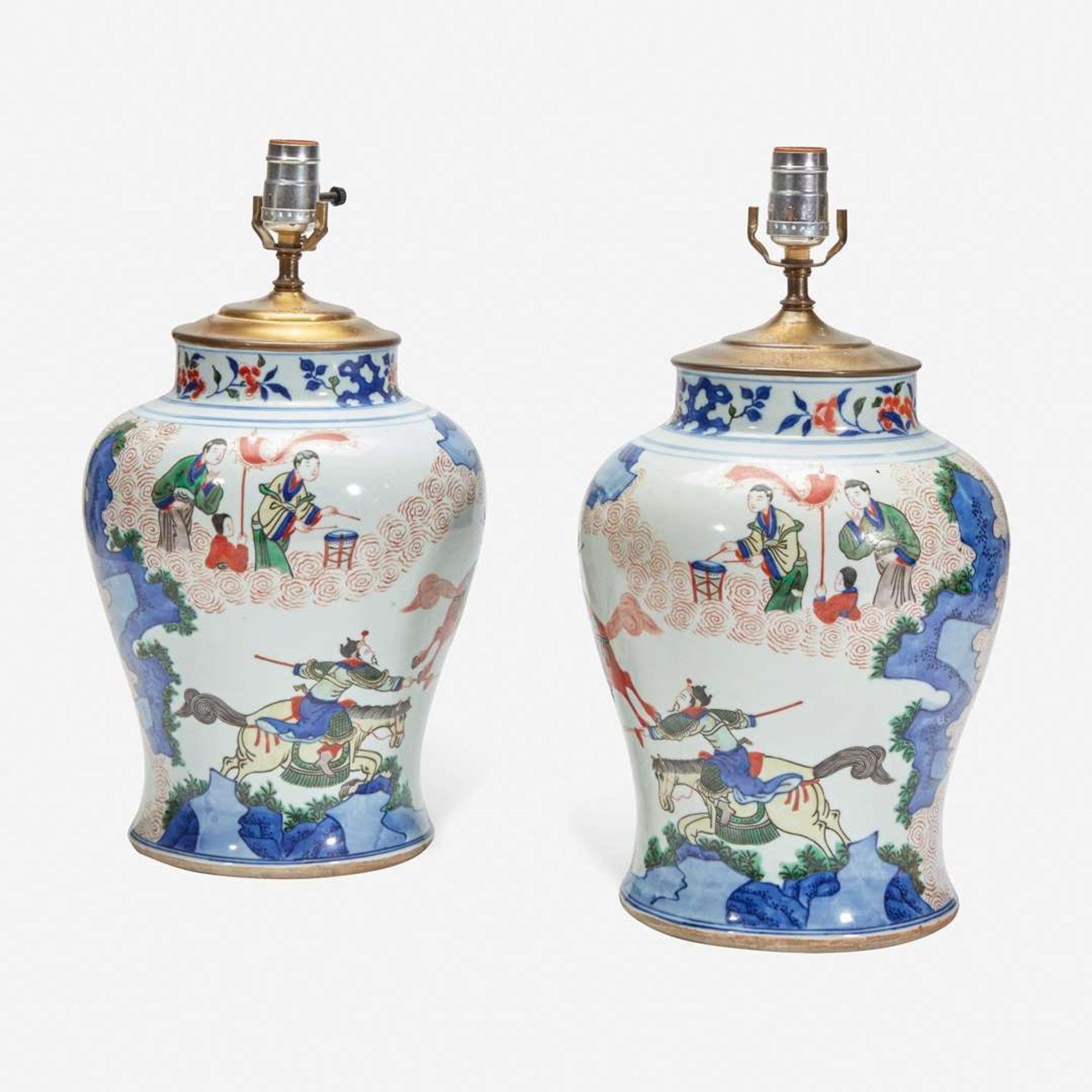A pair of large Chinese wucai-decorated porcelain jars, mounted as lamps