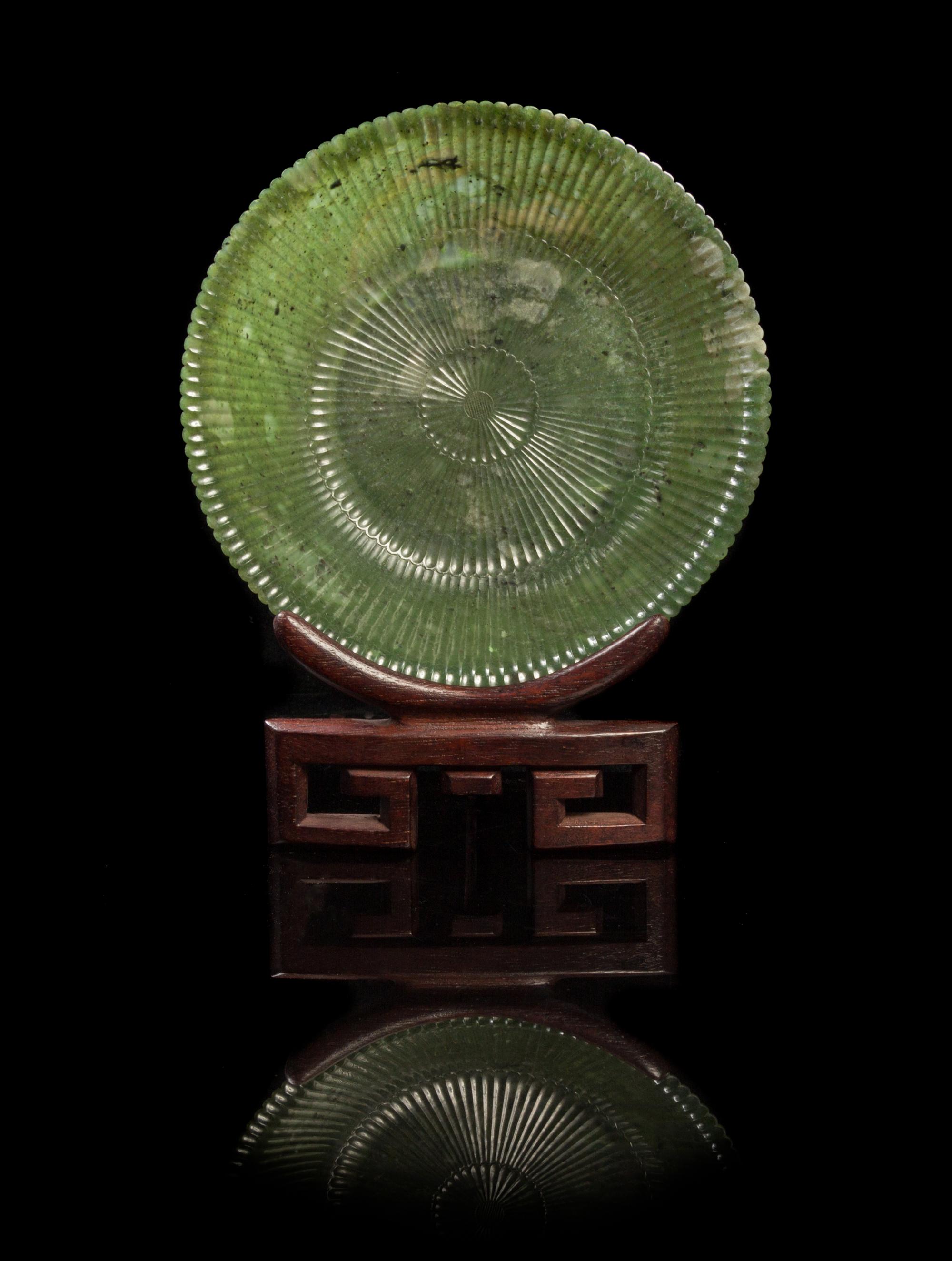 A Chinese Spinach Jade Mughal-Style Chrysanthemum Dish LATE QING DYNASTY, 19TH CENTURY Diameter 7 1/2 inches. — LATE QING DYNASTY, 19TH CENTURY