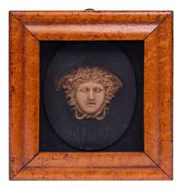A Framed Wax Mask of Medusa
