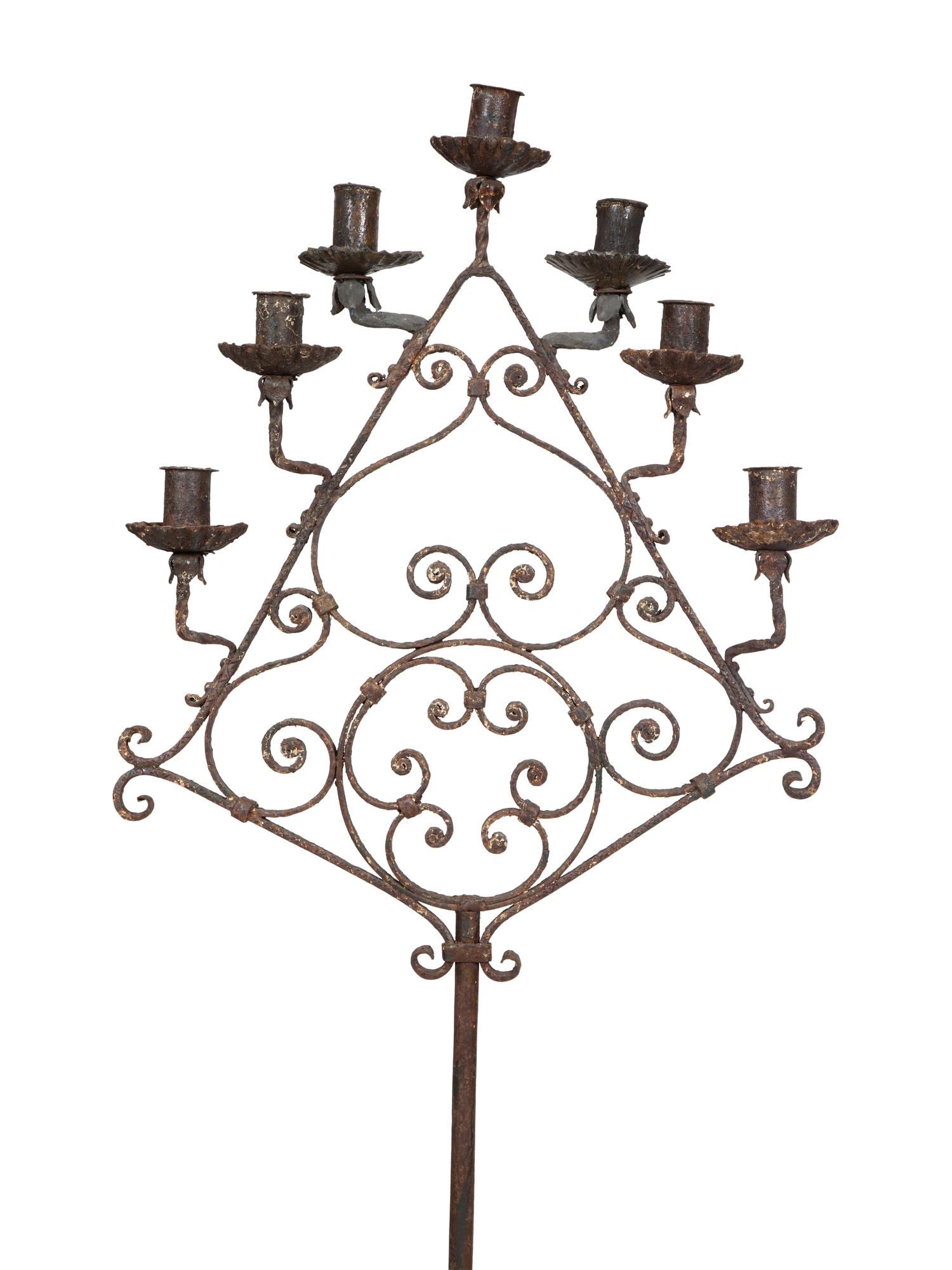A Pair of Mizner Wrought Iron Seven-Light Floor Candelabra