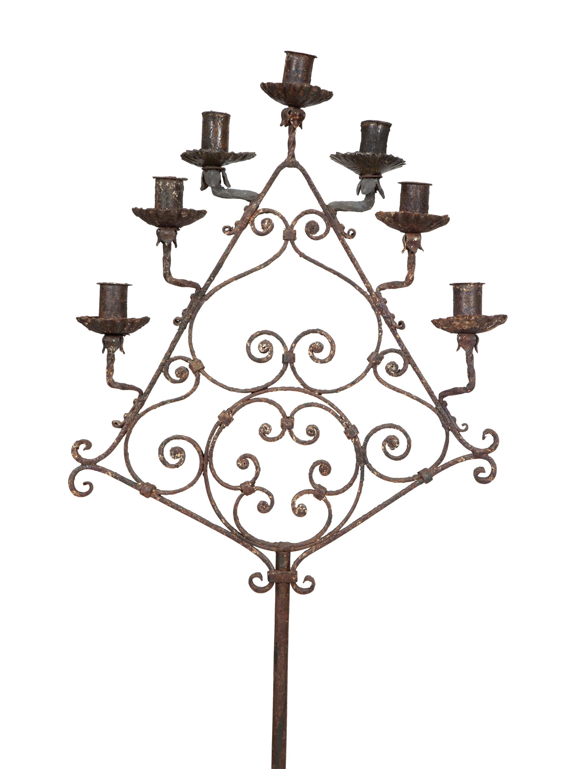 A Pair of Mizner Wrought Iron Seven-Light Floor Candelabra