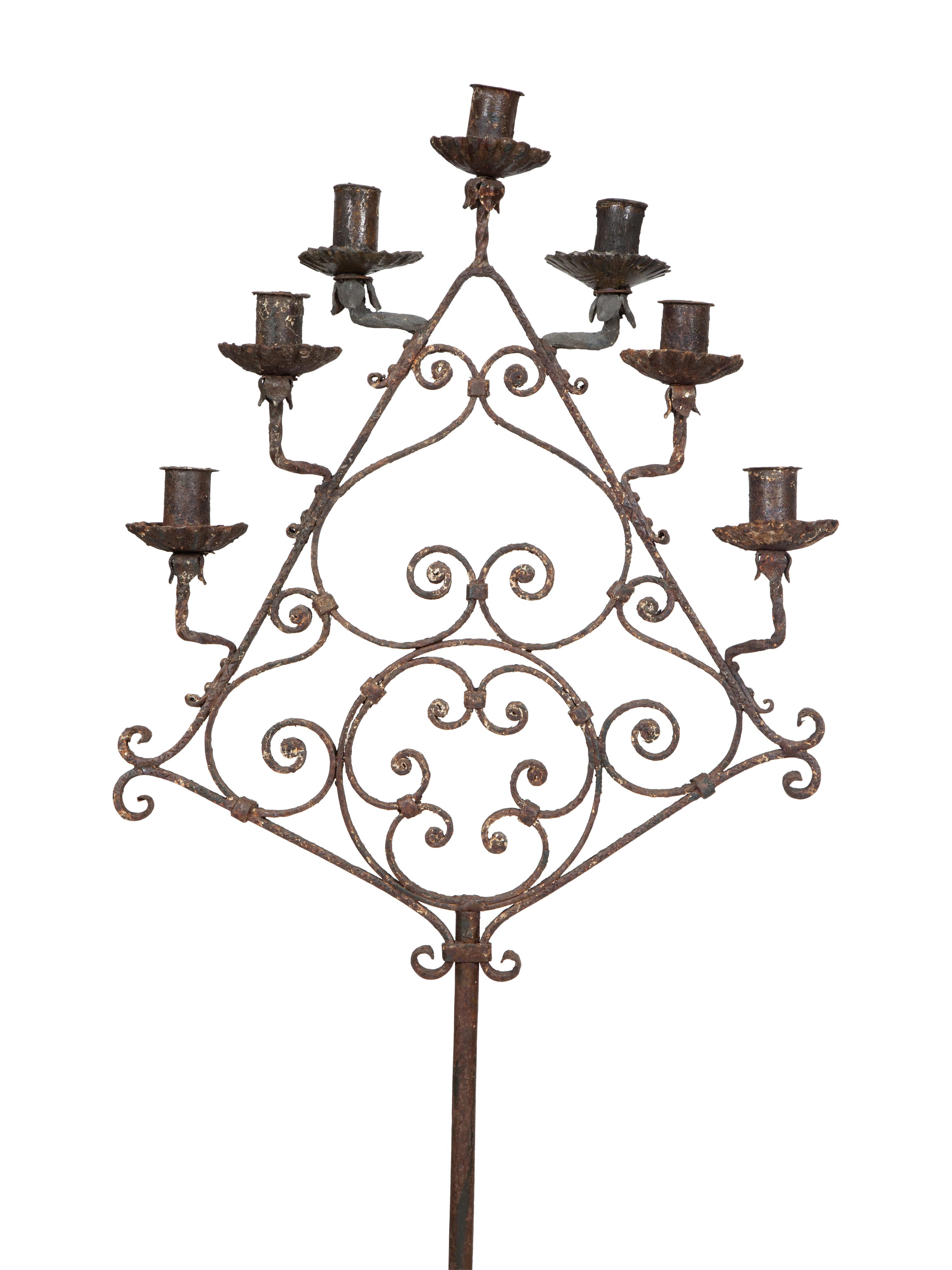 A Pair of Mizner Wrought Iron Seven-Light Floor Candelabra