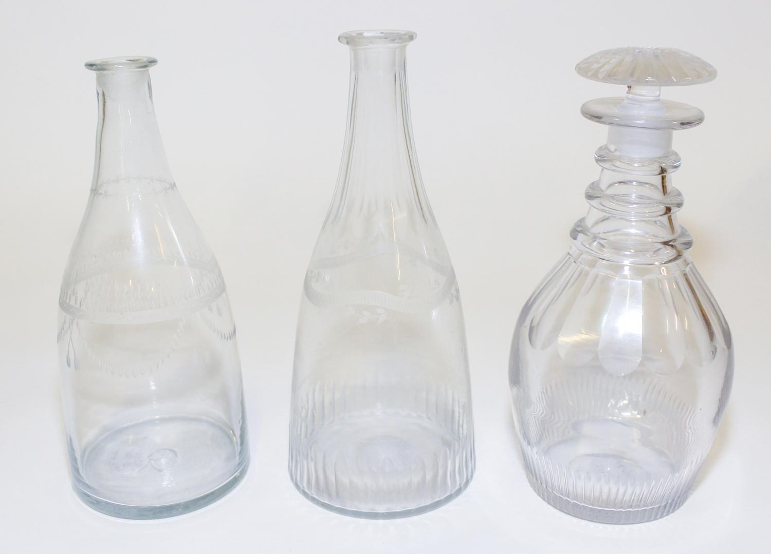 A Group of Three Cut and Etched Glass Decanters Height of tallest 9 1/4 inches. — EARLY 19TH CENTURY