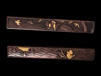 Eight Japanese Mixed-Metal Sword Fittings and Netsuke