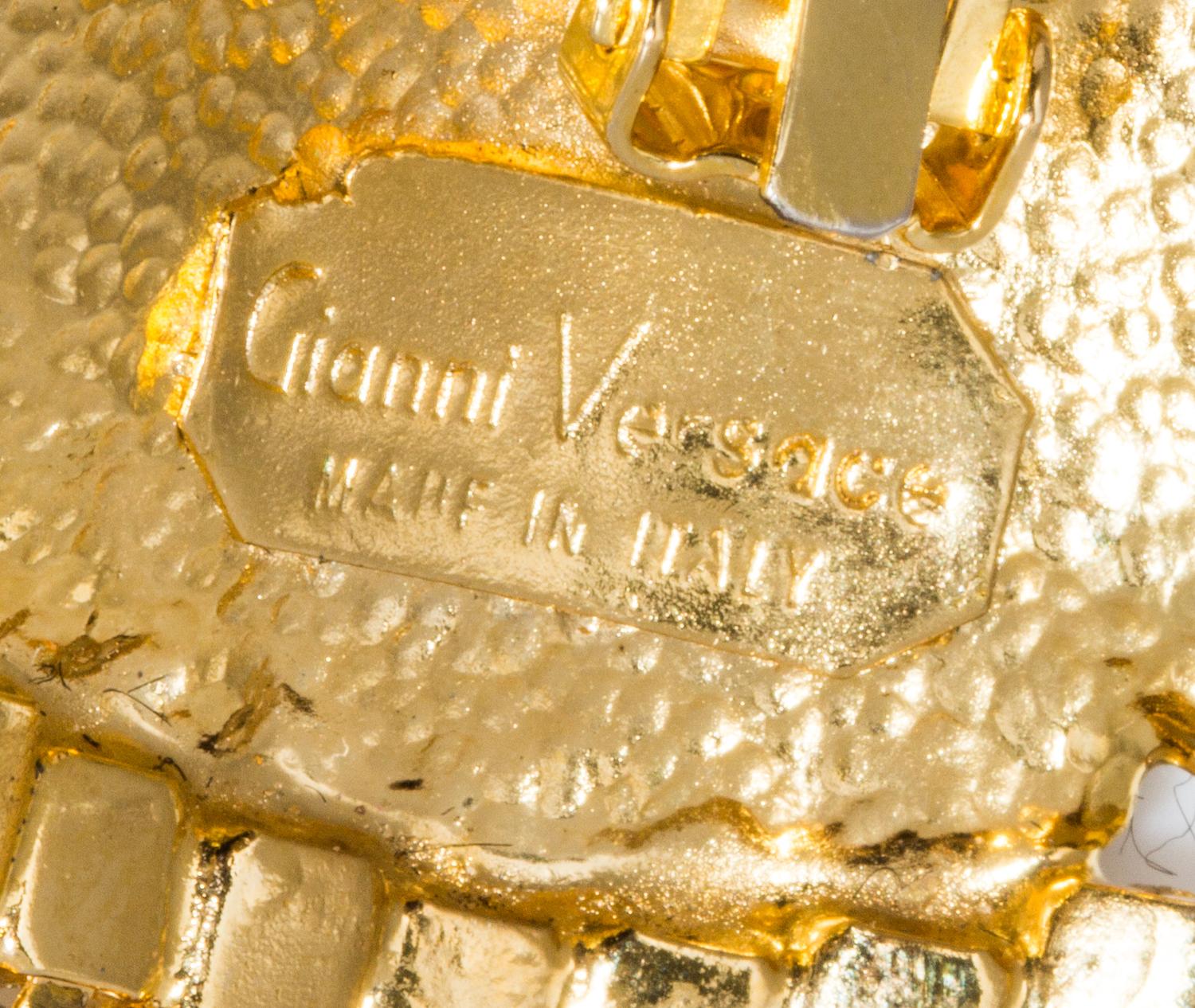 A Pair of Gianni Versace Medusa and Rhinestone Fringe Earclips,