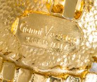 A Pair of Gianni Versace Medusa and Rhinestone Fringe Earclips,