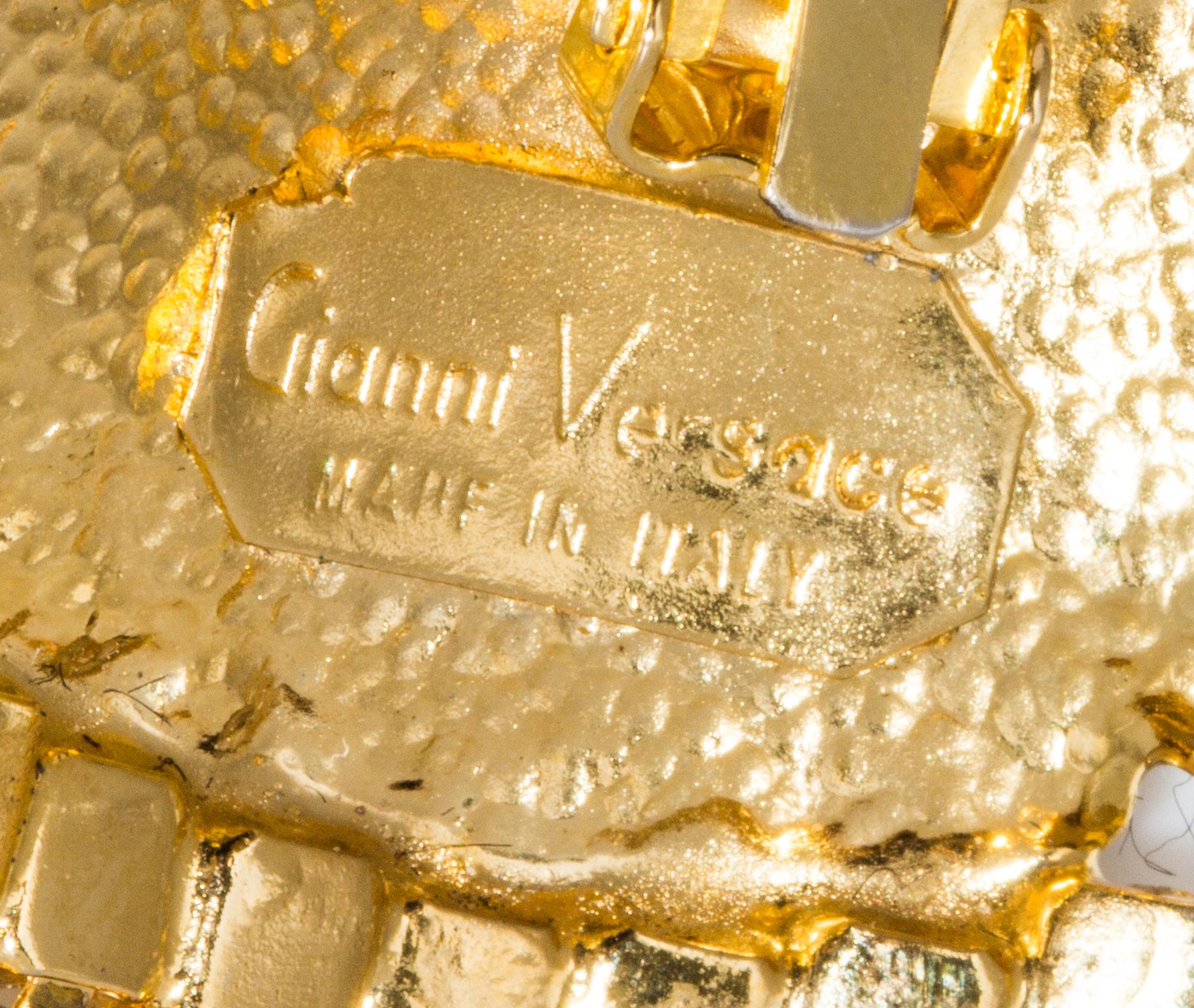A Pair of Gianni Versace Medusa and Rhinestone Fringe Earclips,