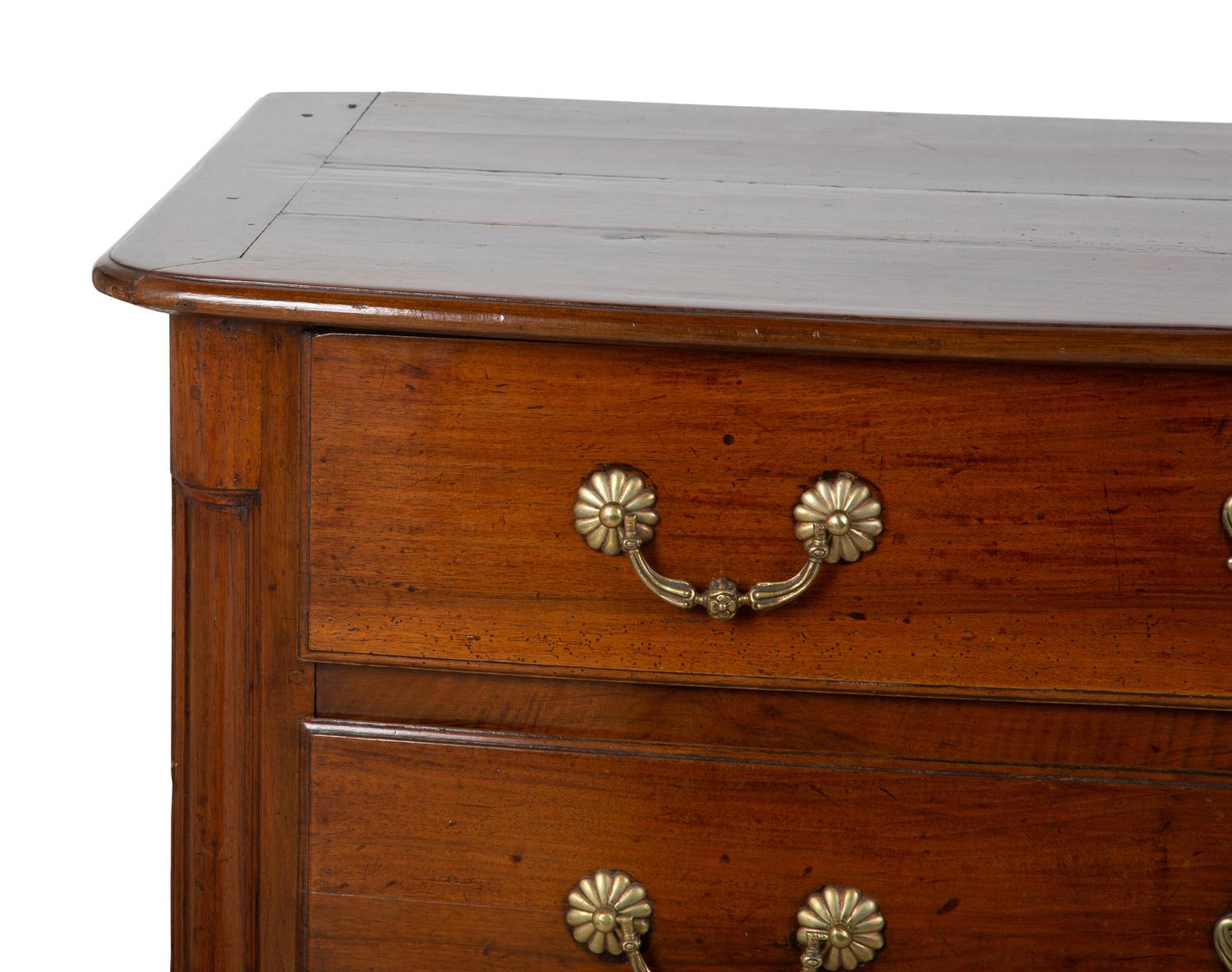 A Louis XV Style Walnut Commode