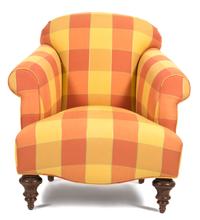 An Upholstered Armchair — 20TH CENTURY