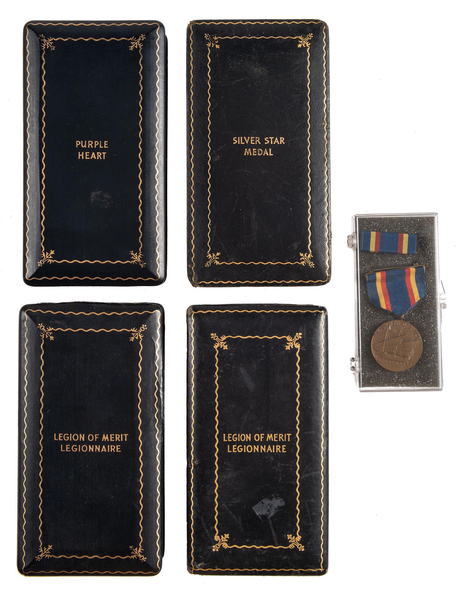 [WORLD WAR II AND PRE-WAR]. A group of 5 medals, including a Purple Heart, two Legion of Merit and one Silver Star.