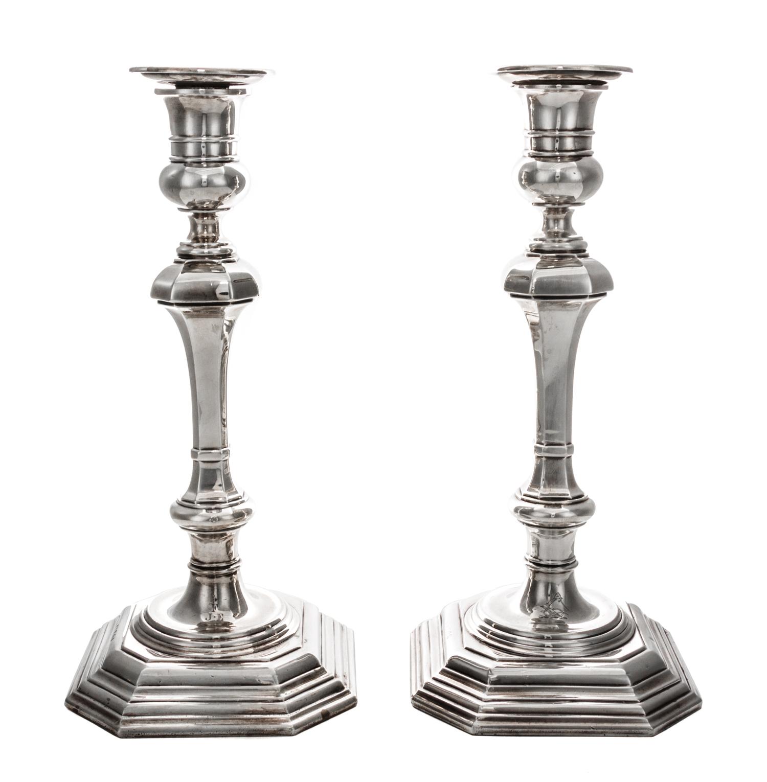 A Pair of Queen Anne Style Silver Candlesticks, Crichton Bros., London, 1919, each of square baluster form with weighted base.