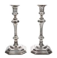 A Pair of Queen Anne Style Silver Candlesticks, Crichton Bros., London, 1919, each of square baluster form with weighted base.