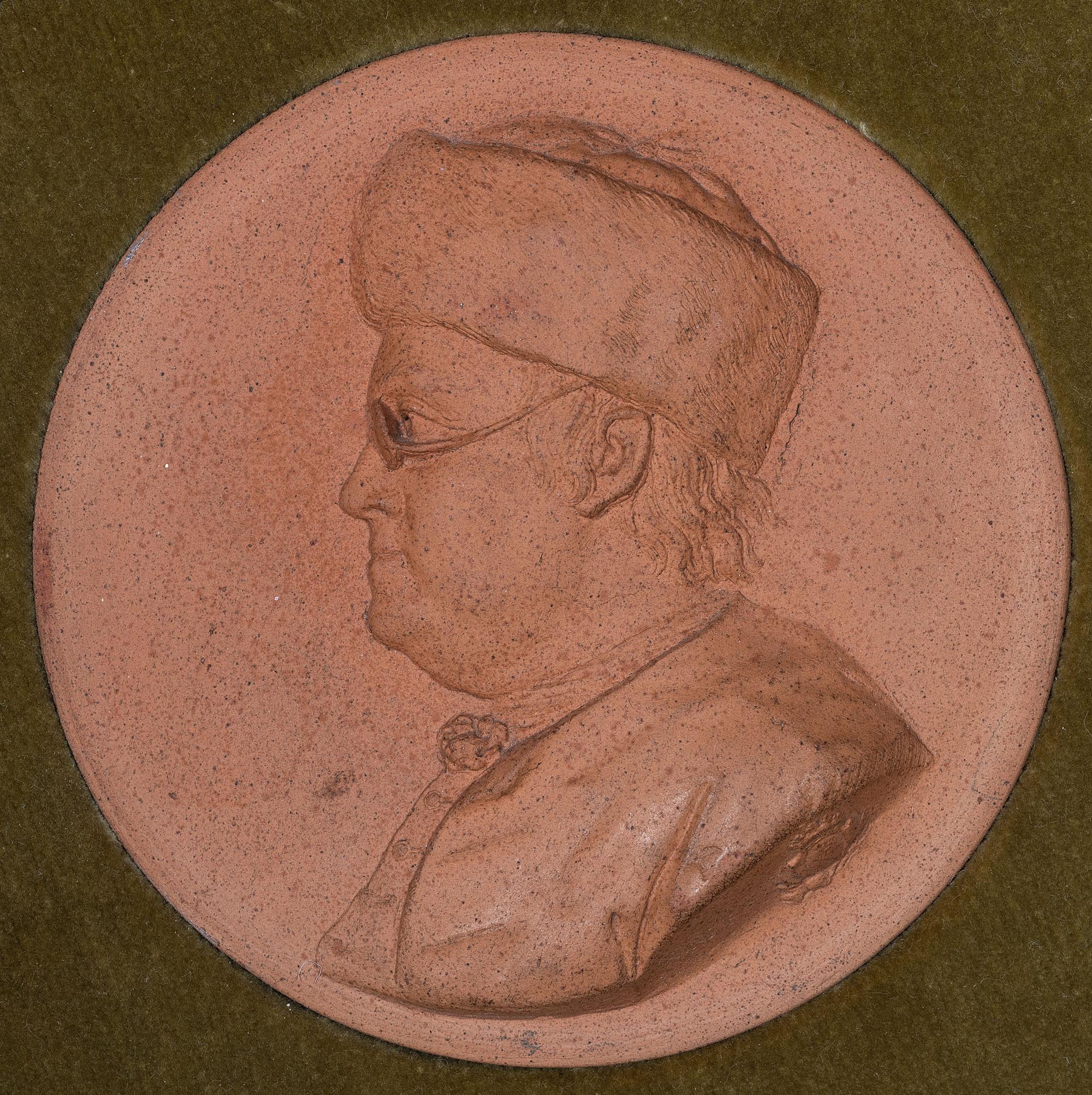 A Terra Cotta Portrait Medallion of Benjamin Franklin