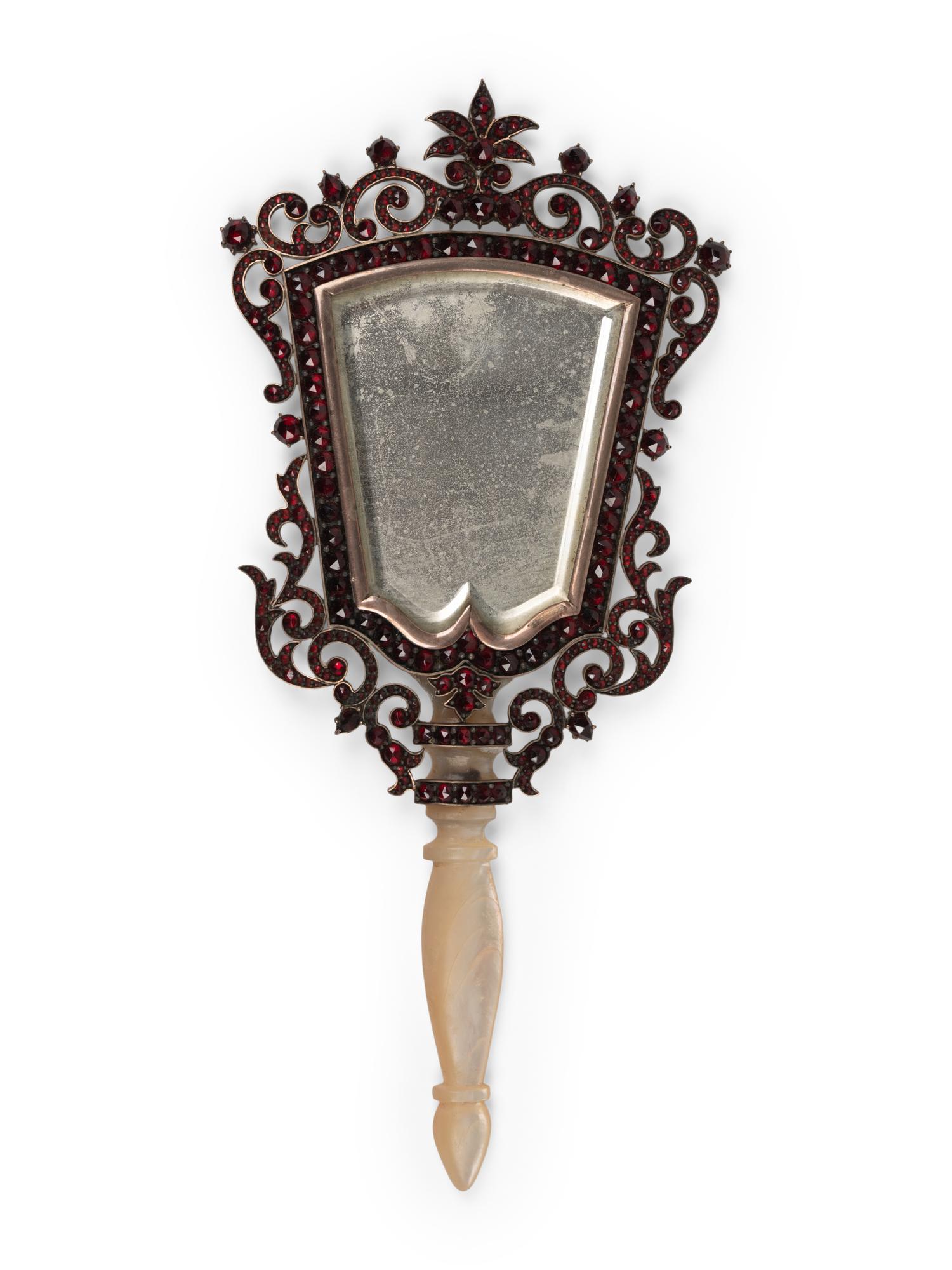 A Continental Mother-of-Pearl Handled Garnet-Inset Mirror