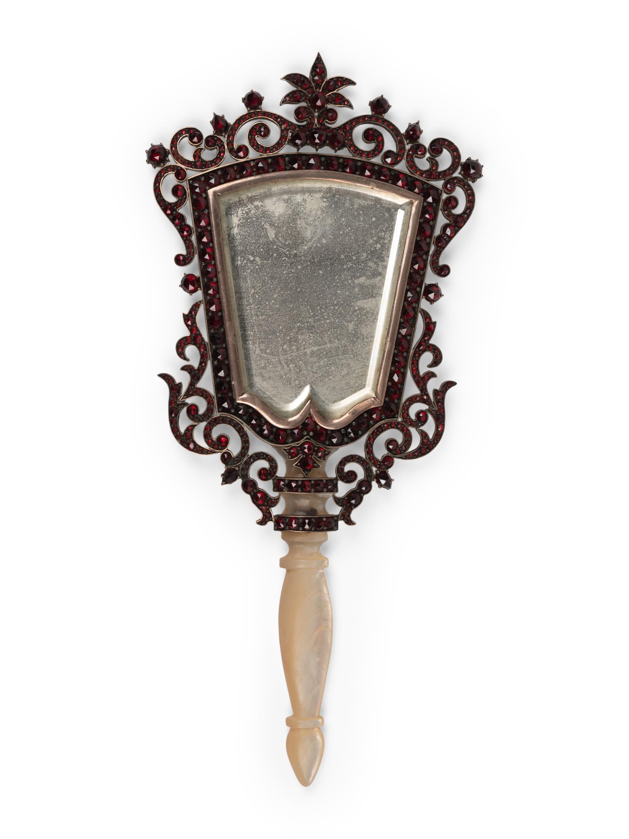 A Continental Mother-of-Pearl Handled Garnet-Inset Mirror