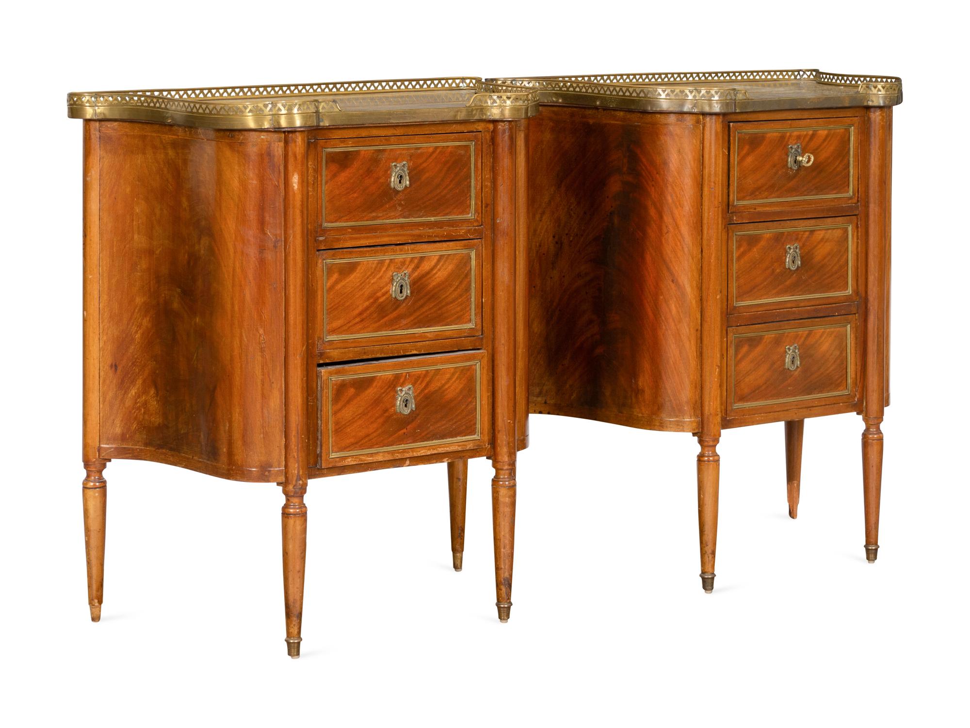 A Pair of Louis XVI Style Brass-Mounted Mahogany Side Cabinets with Marble Tops