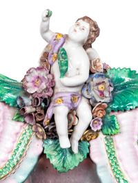 A Pair of Continental Porcelain Girandole Mirrors