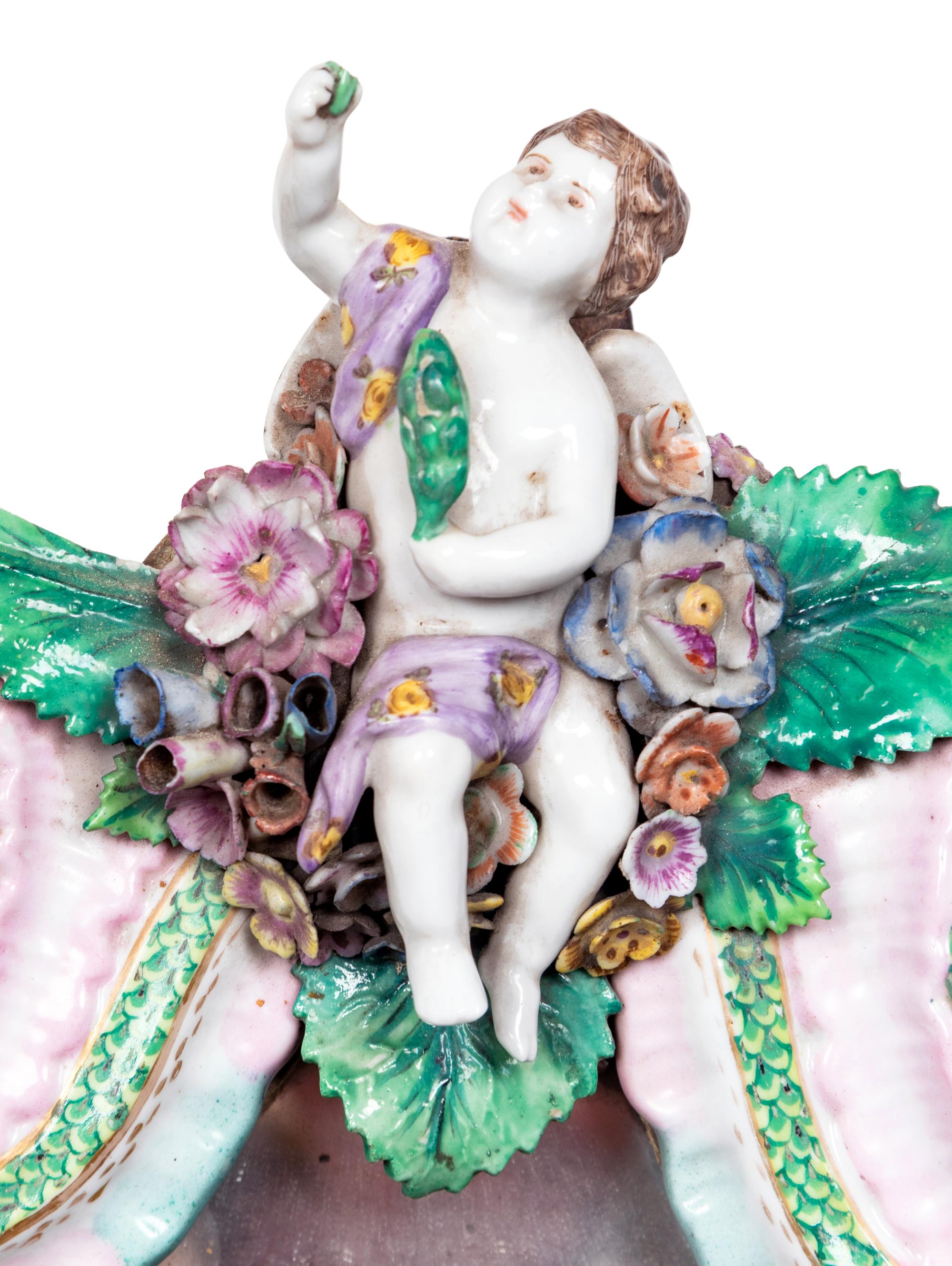 A Pair of Continental Porcelain Girandole Mirrors