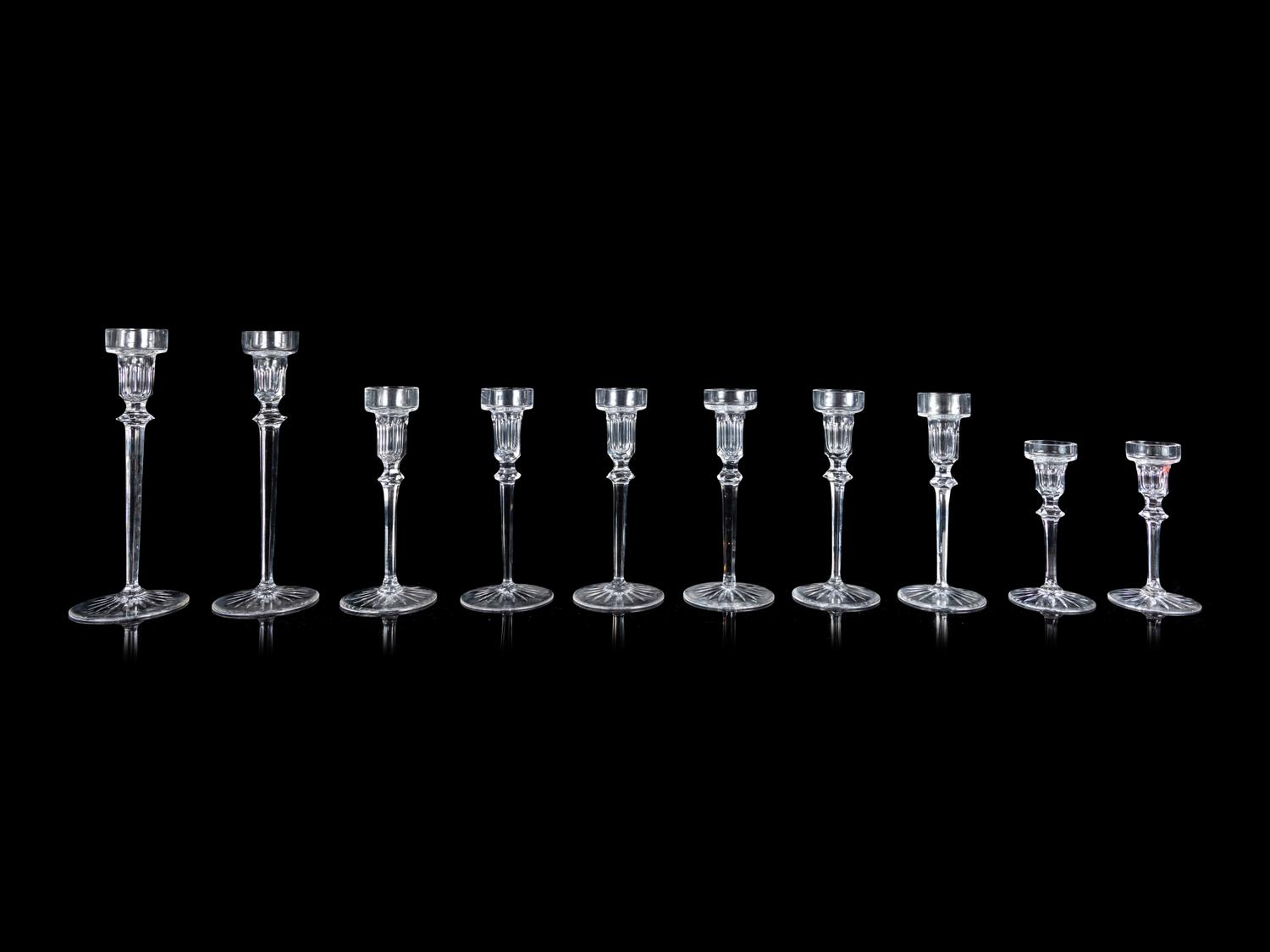 Ten Graduated Glass Candlesticks