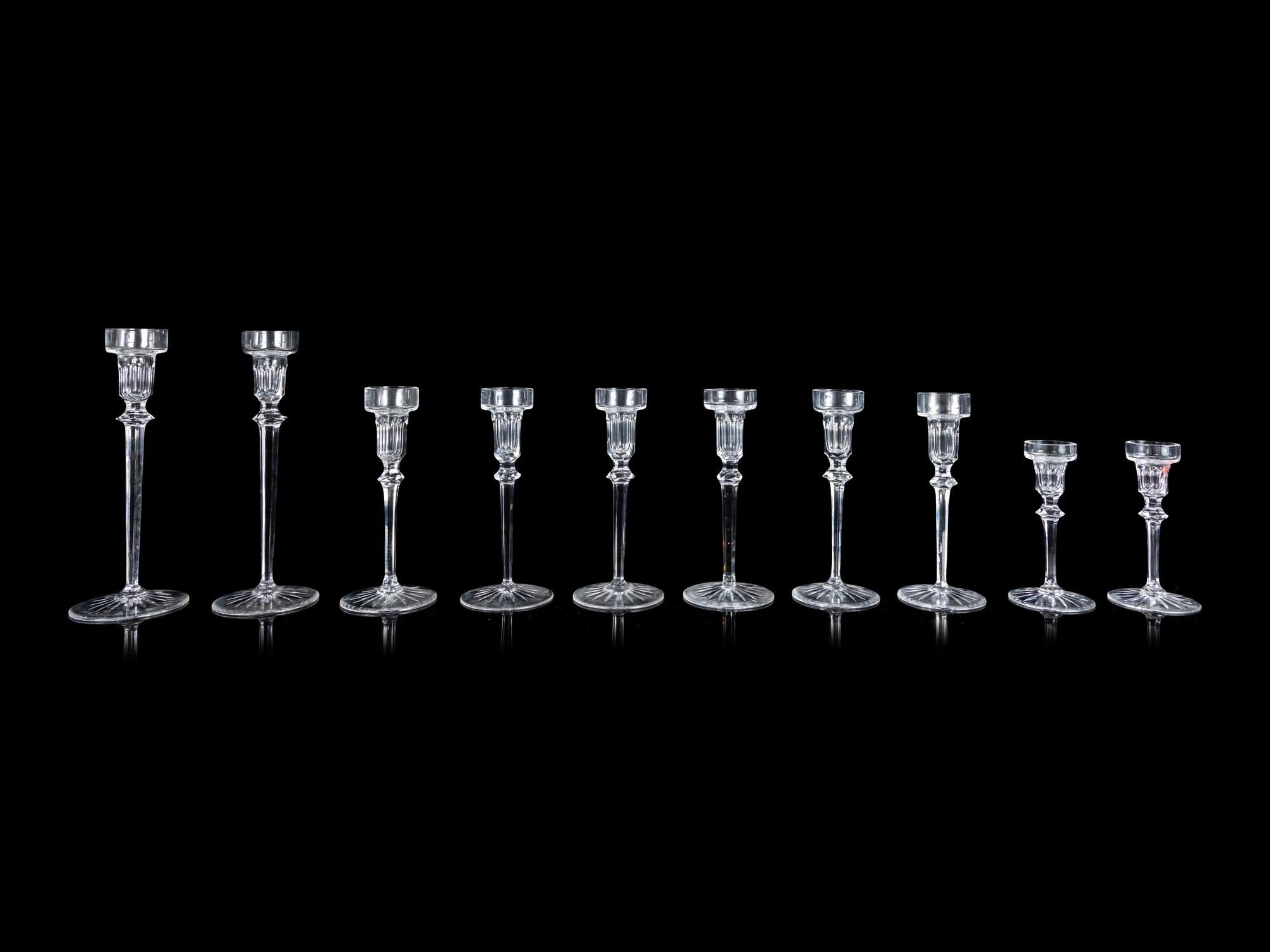 Ten Graduated Glass Candlesticks