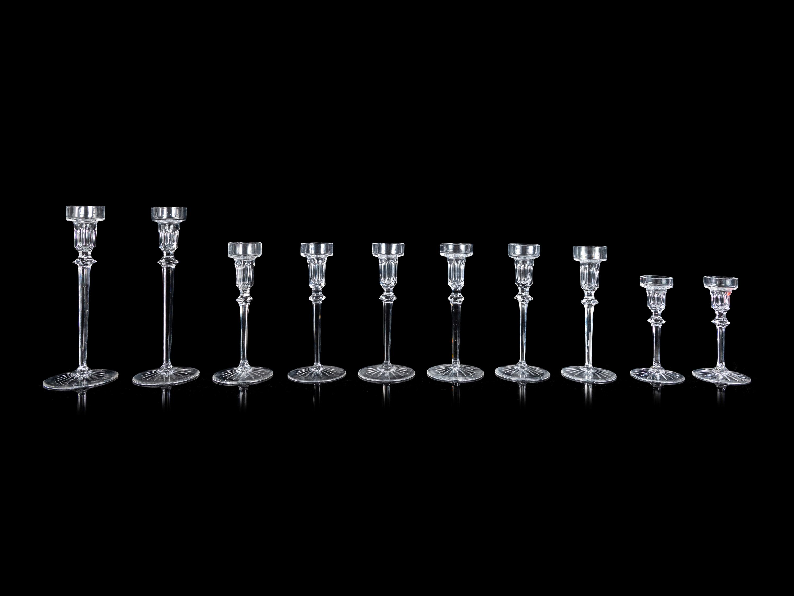 Ten Graduated Glass Candlesticks