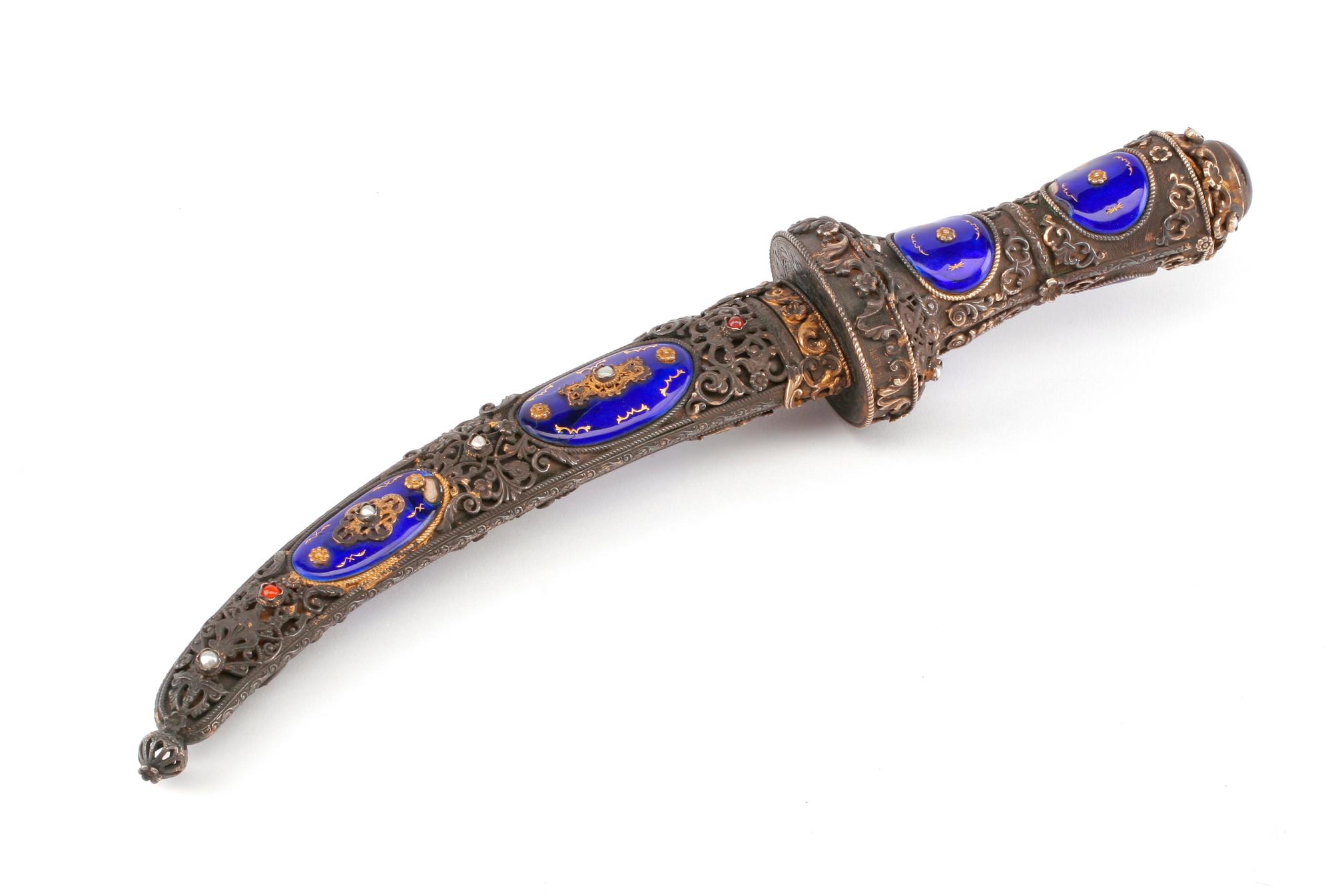 An Eastern European Silvered, Jeweled and Enameled Dagger Length 11 1/2 inches.