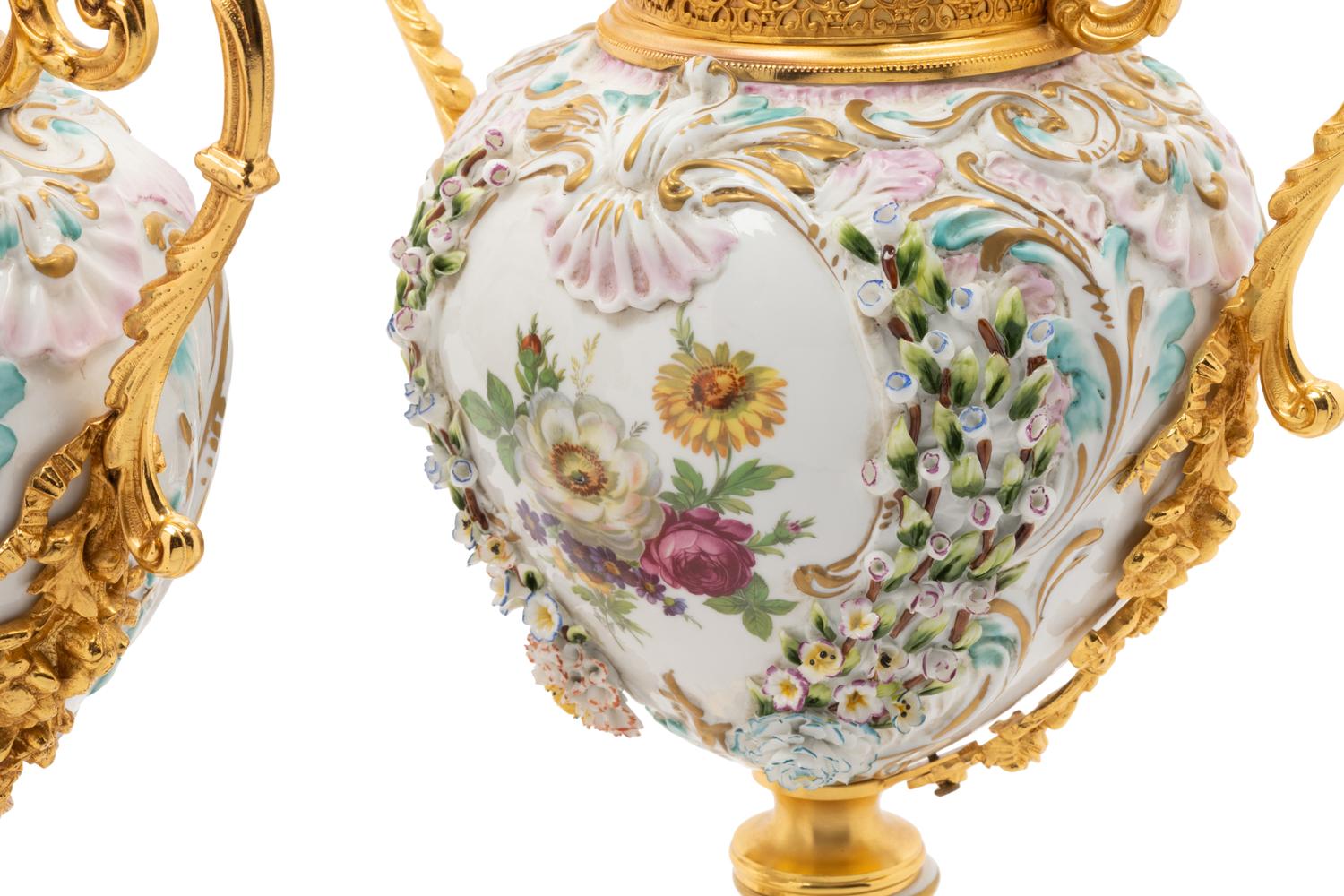 A Pair of Tiche Gilt Metal Mounted Porcelain Urns
