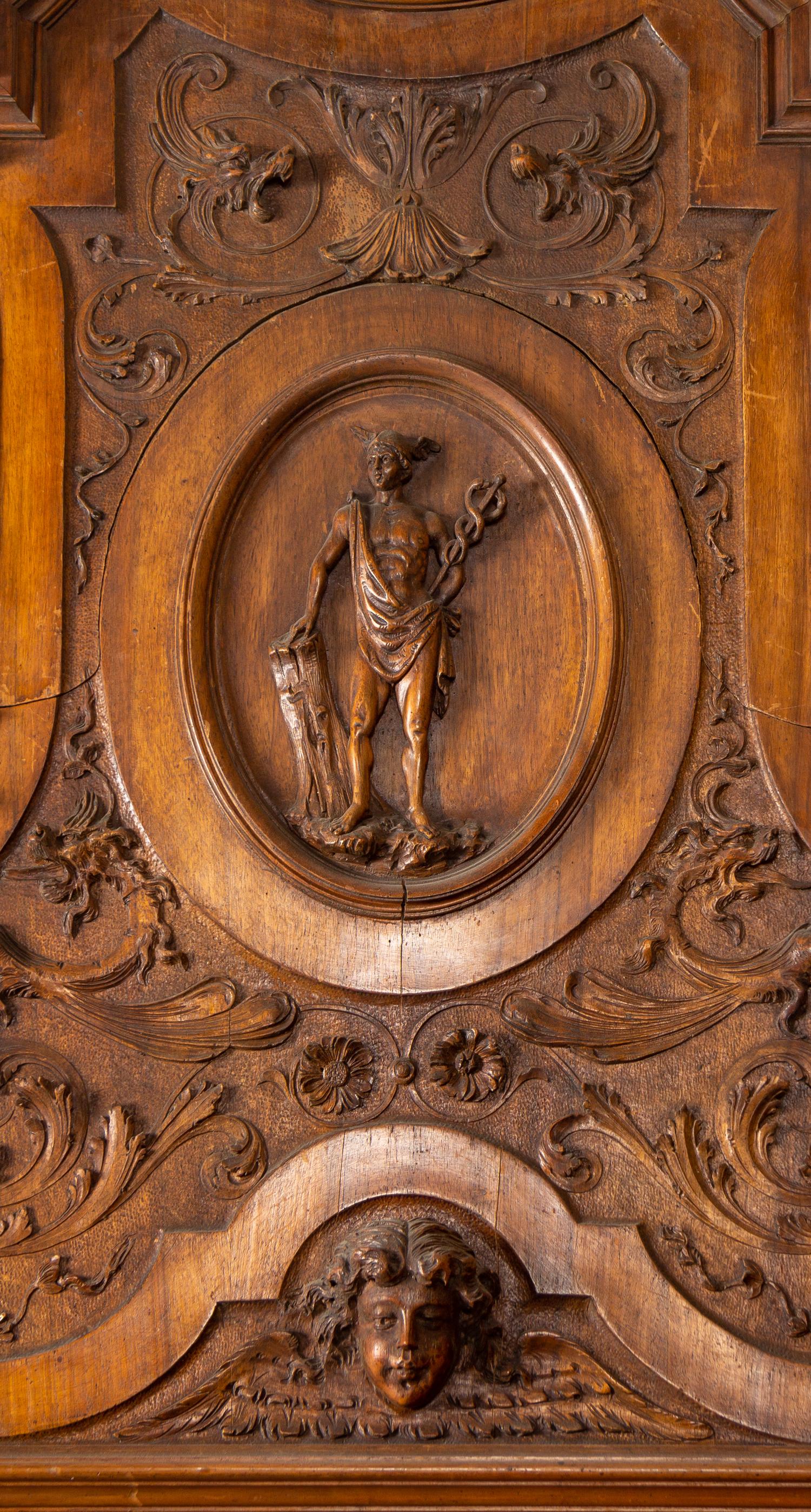 An Italian Renaissance Revival Carved Walnut Armoire