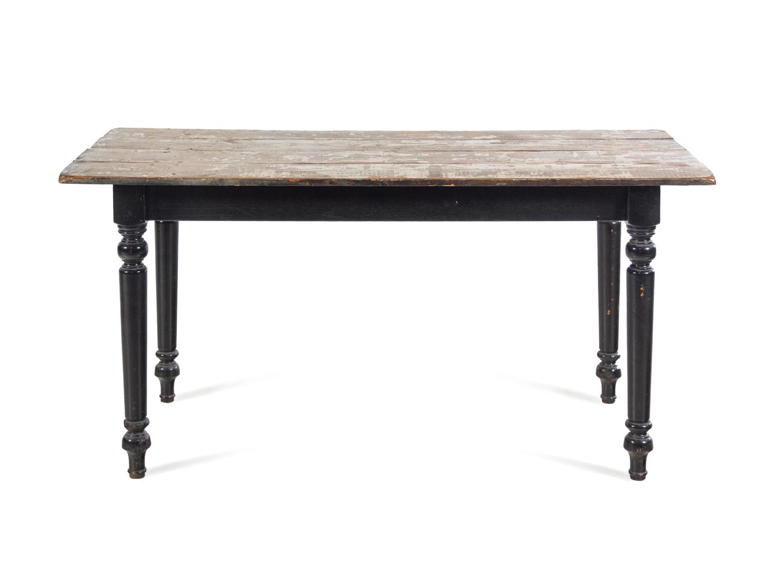 A French Provincial Painted and Parcel Ebonized Dining Table