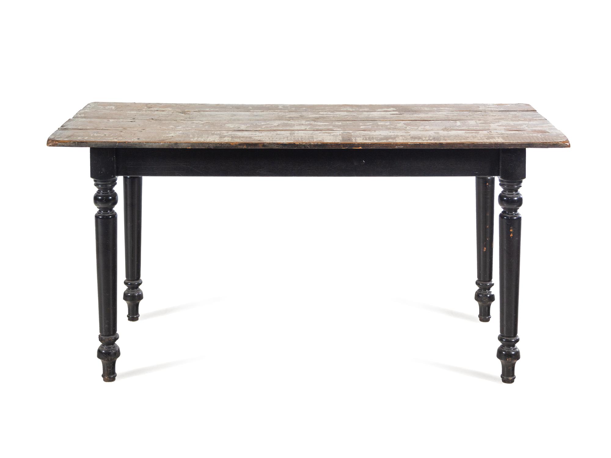 A French Provincial Painted and Parcel Ebonized Dining Table