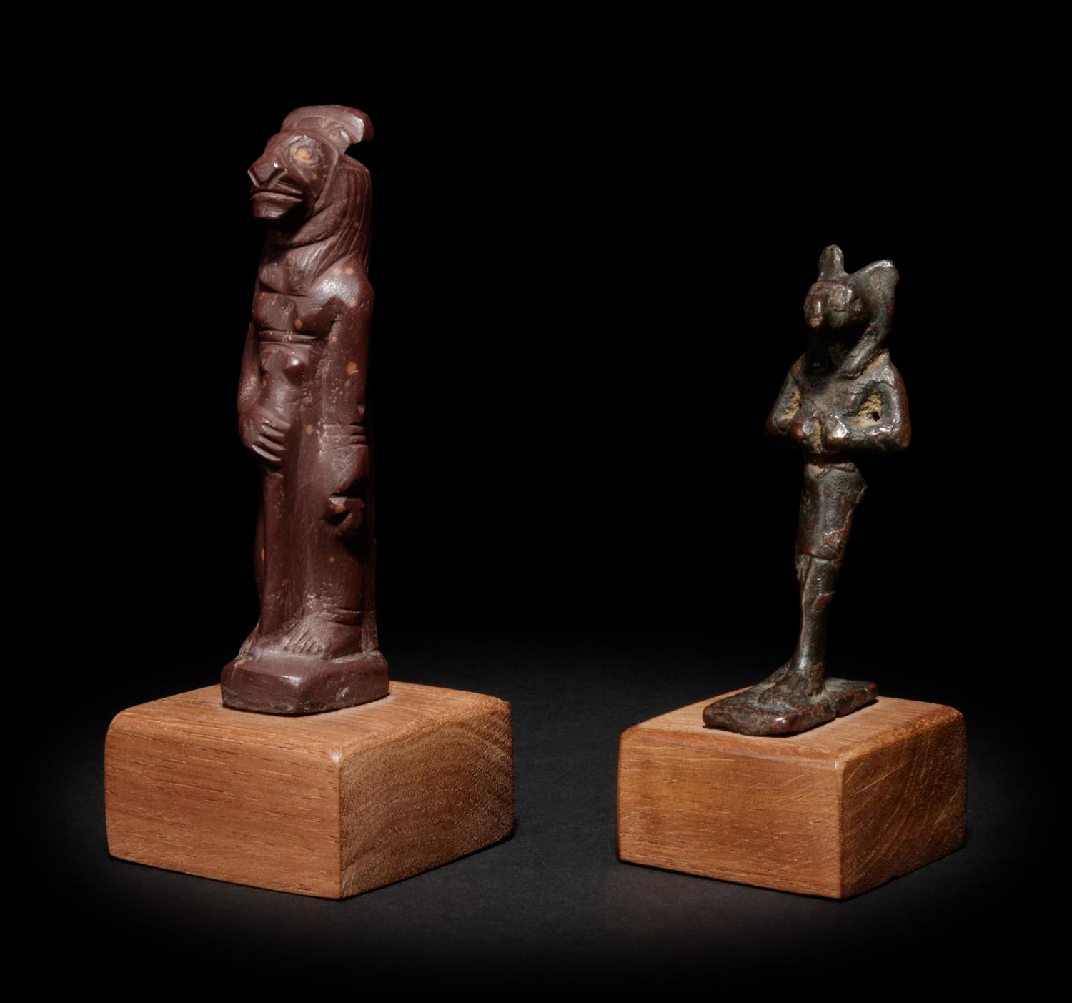 An Egyptian Stone Striding Bastet and an Egyptian Bronze Anubis