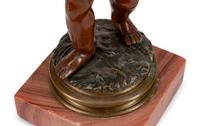 A Pair of French Patinated Bronze Figures of Infant Water Carriers — CIRCA 1900