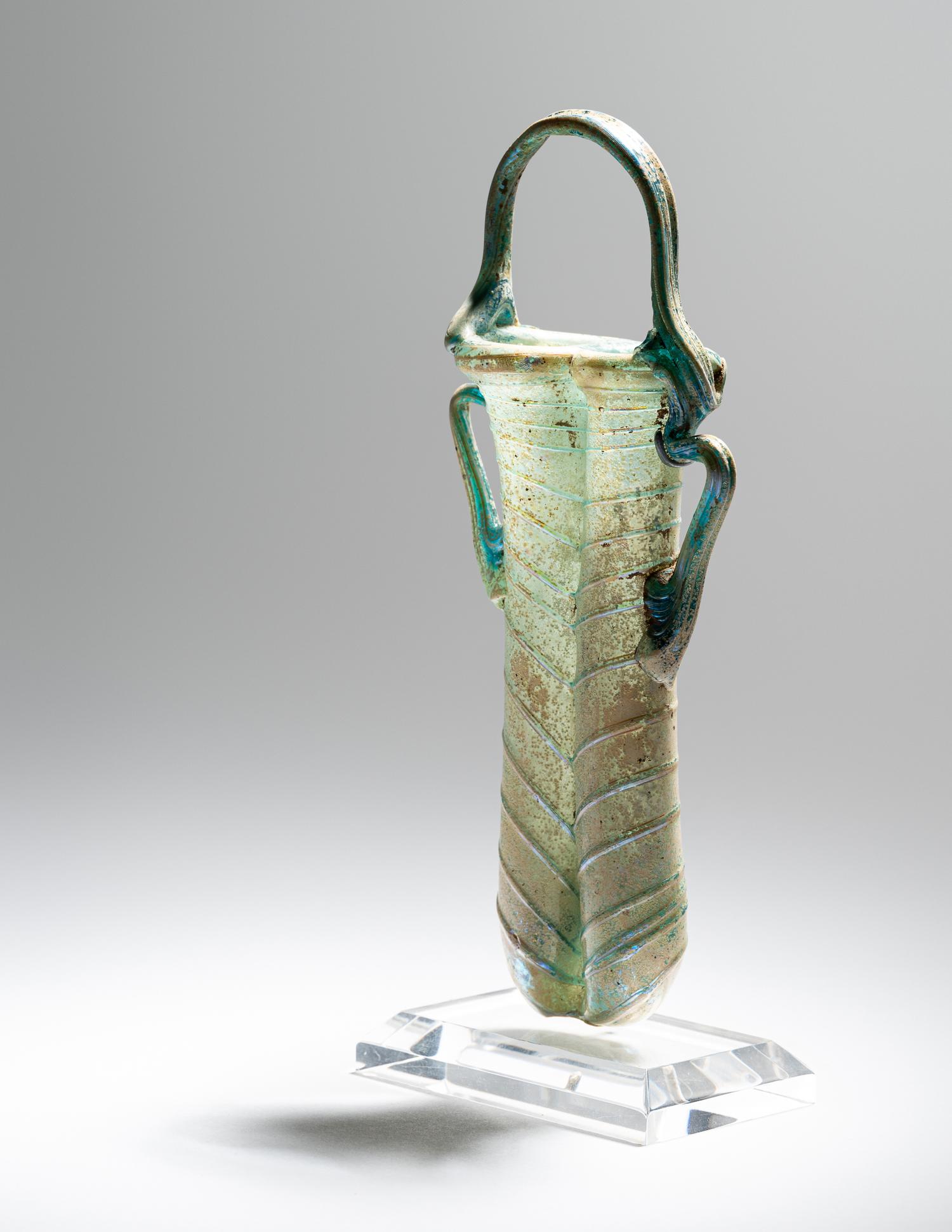 A Roman Green Glass Double Unguentarium