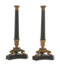 A Pair of Charles X Style Patinated and Gilt Bronze Candlesticks