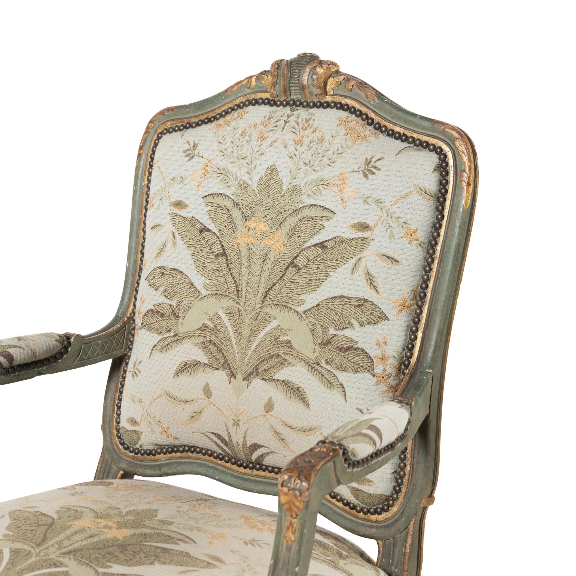 A Pair of Italian Rococo Style Painted and Parcel Gilt Armchairs