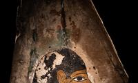 An Egyptian Polychrome Wood Fragment of a Sarcophagus with Isis
