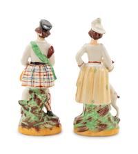 Two Staffordshire Style Figural Groups