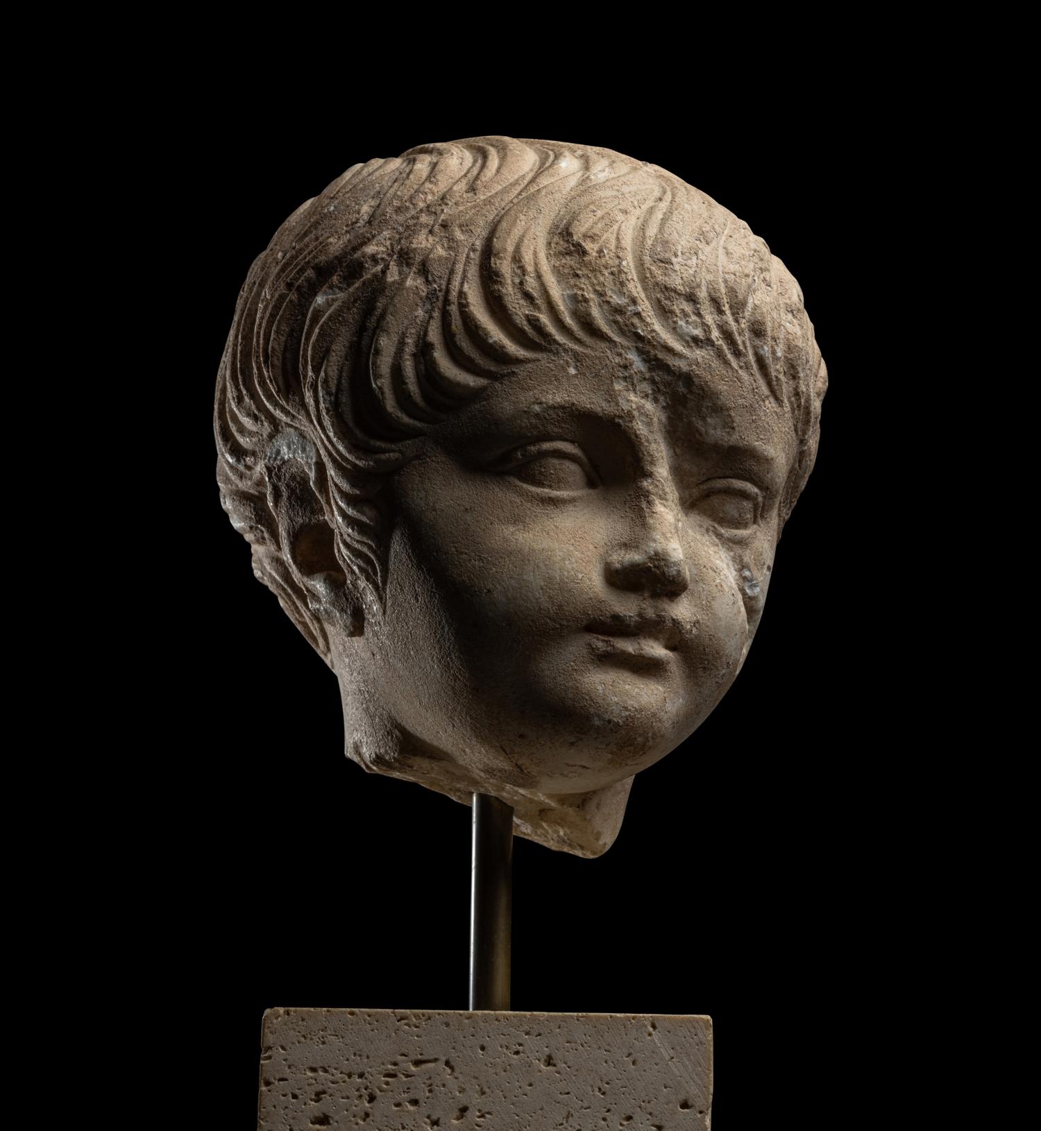 A Roman Marble Portrait Head of a Boy